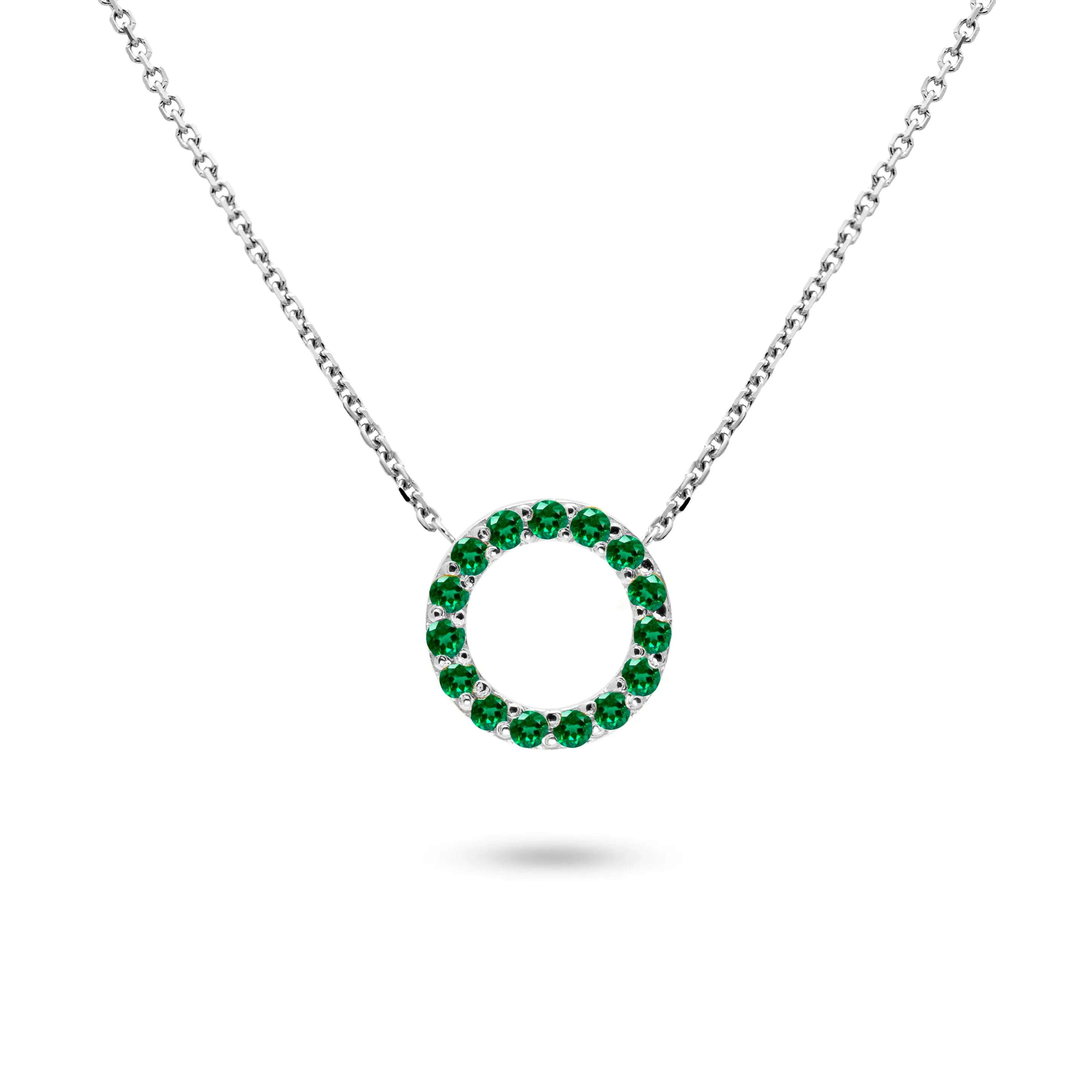 14K gold tsavorite necklace with 15 tsavorite gemstones, featuring a circular pendant design.