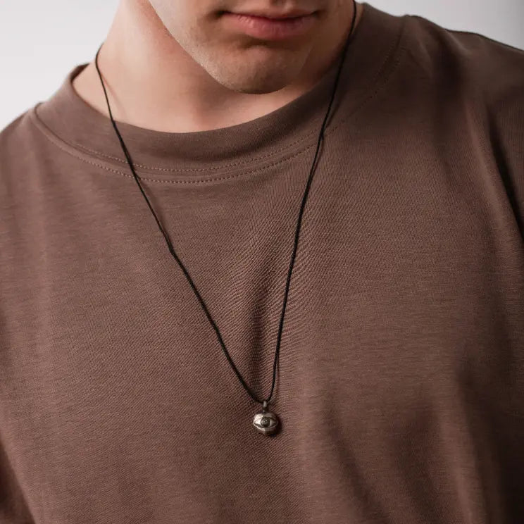 Eye Necklace Oxidized Silver Brown Diamond on a model