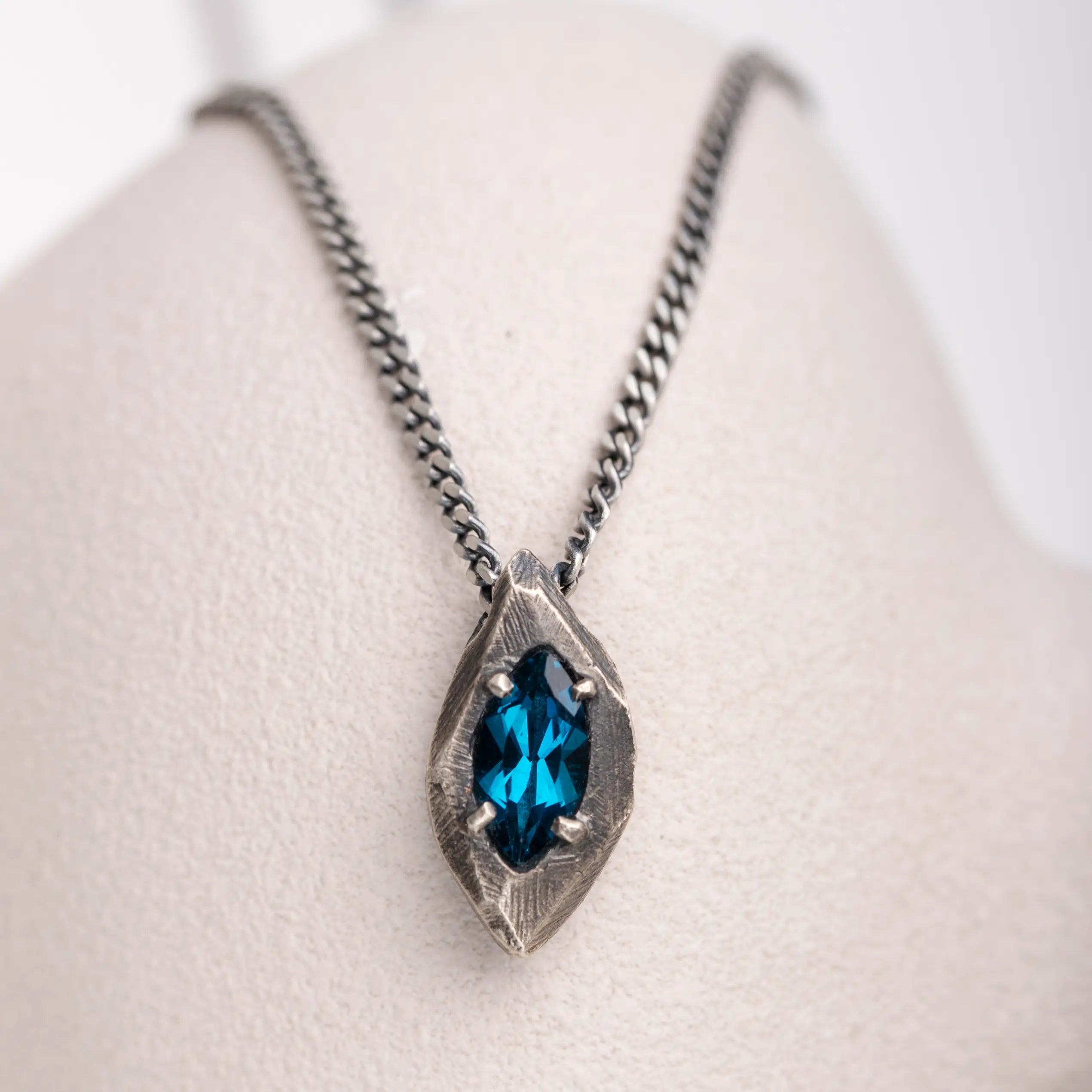 Blue Topaz Necklace Oxidized Silver Marquise with marquise-cut London blue topaz pendant on a silver chain.