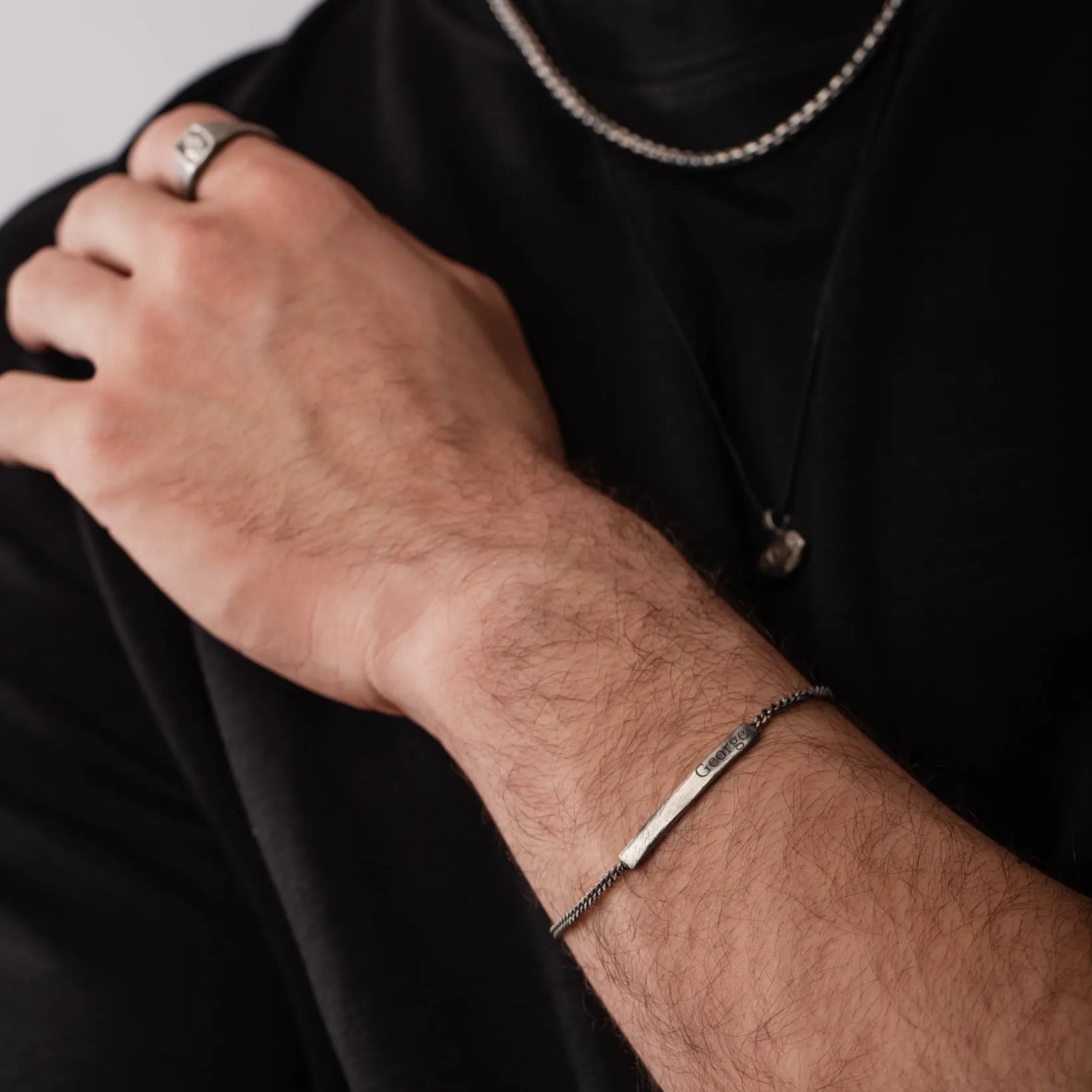 ID Men's Bracelet Oxidized Silver Personalized on wrist, sterling silver with handcrafted bar and curb chain, ideal gift for men.