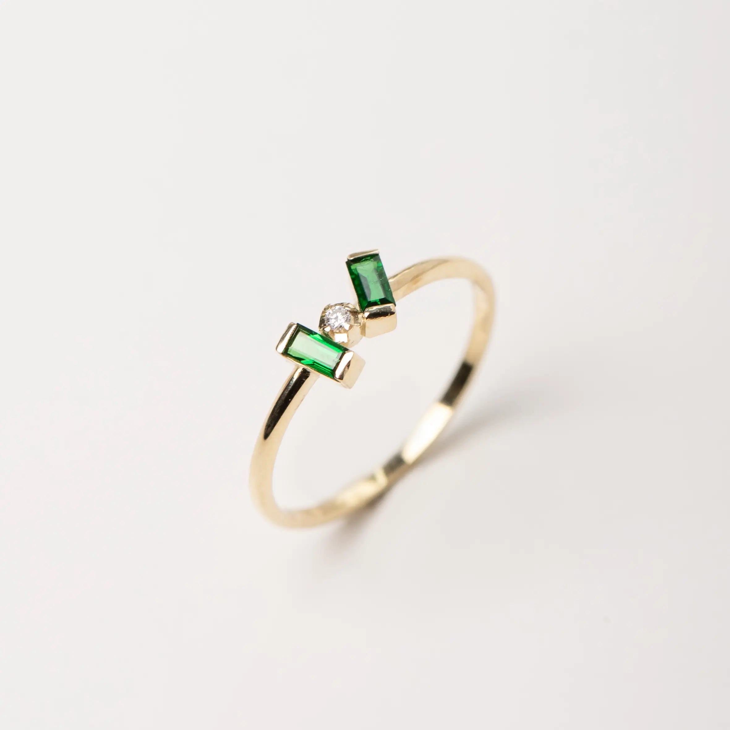 14K Gold Tsavorite Diamond Baguette Ring with elegant minimalist design, perfect for stacking.