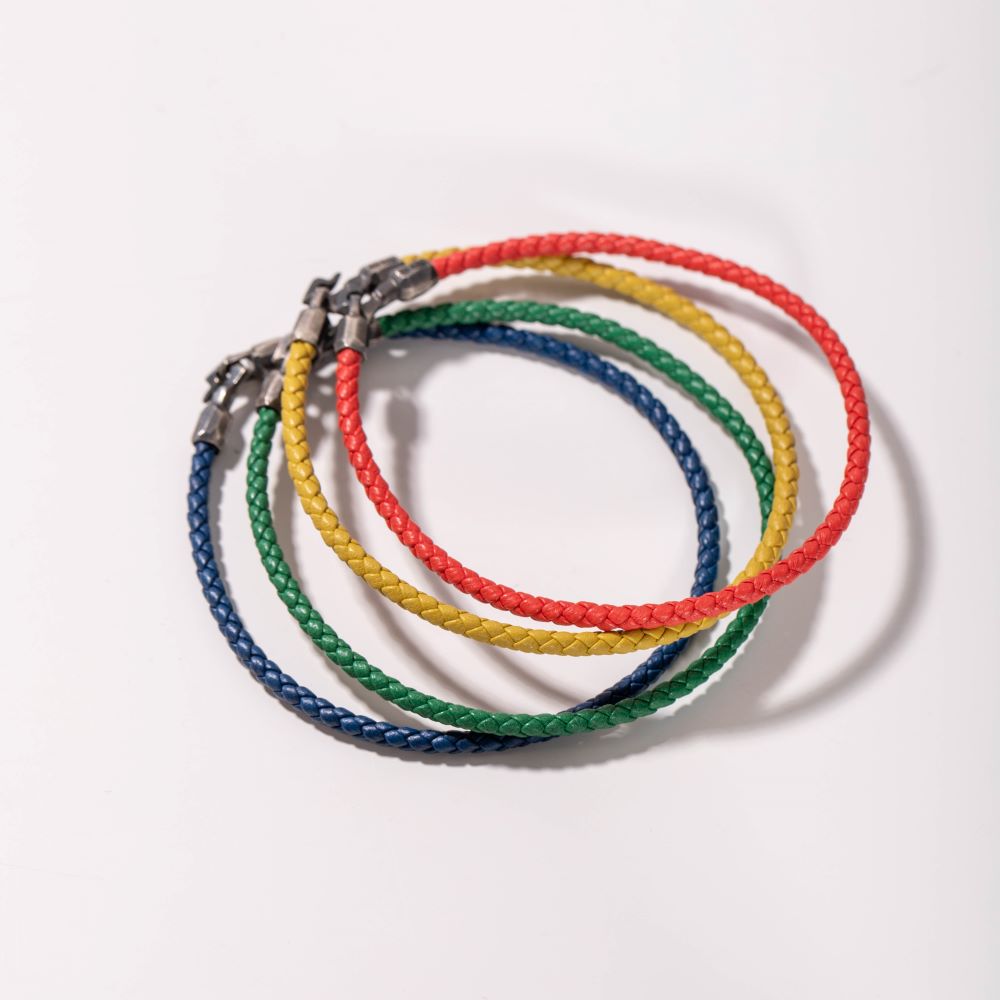 Colorful leather cord bracelets with oxidized silver clasps, including focus keyword Blue Leather Cord Bracelet.