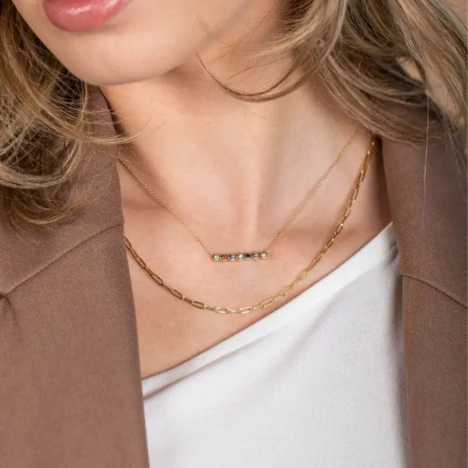 Woman wearing Sapphire Bar Necklace 14K Multicolor with colorful sapphires and elegant gold chain