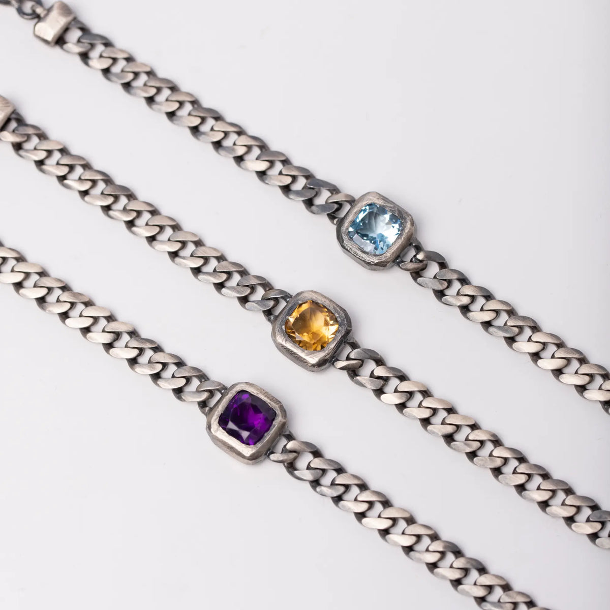 Amethyst, citrine and blue topaz bracelets in oxidized silver