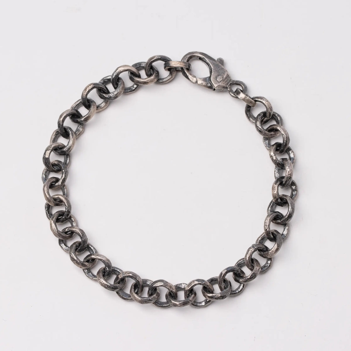 Close-up of Men's Round Link Chain Bracelet in Oxidized Silver