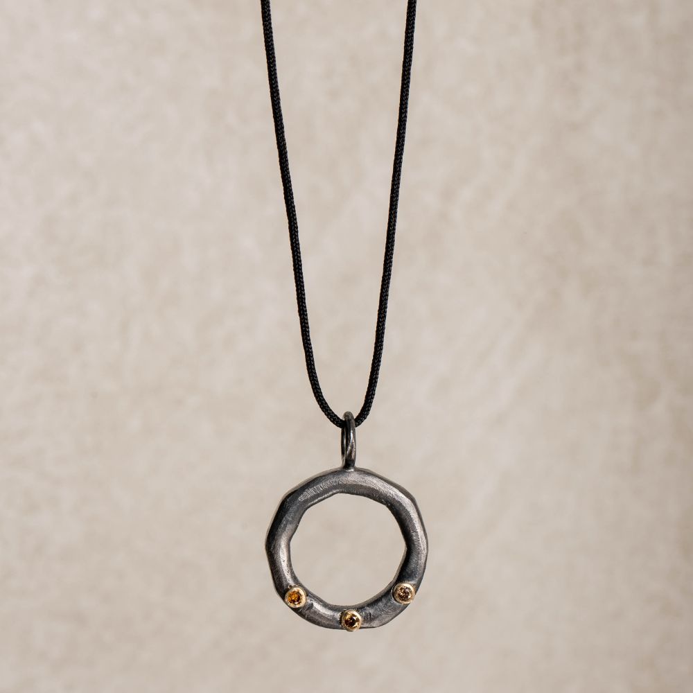 Brown diamond circle necklace in silver and 14K gold, featuring a handmade oxidized circle pendant with brown diamonds, perfect gift for men and women.
