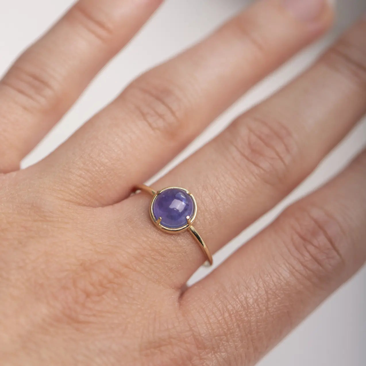 Tanzanite Solitaire Ring 14K Gold featuring a natural tanzanite gemstone, handmade design, 2ct stone, elegant gift package, certificate included.