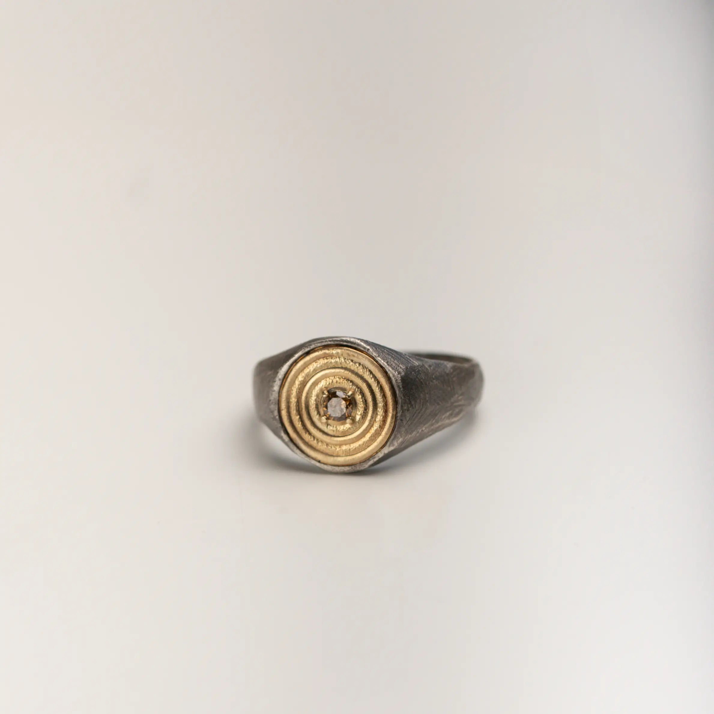 Round Ring 14K Gold and Silver With Brown Diamond, featuring a bold handcrafted design in oxidized sterling silver, 14K gold, and diamond.