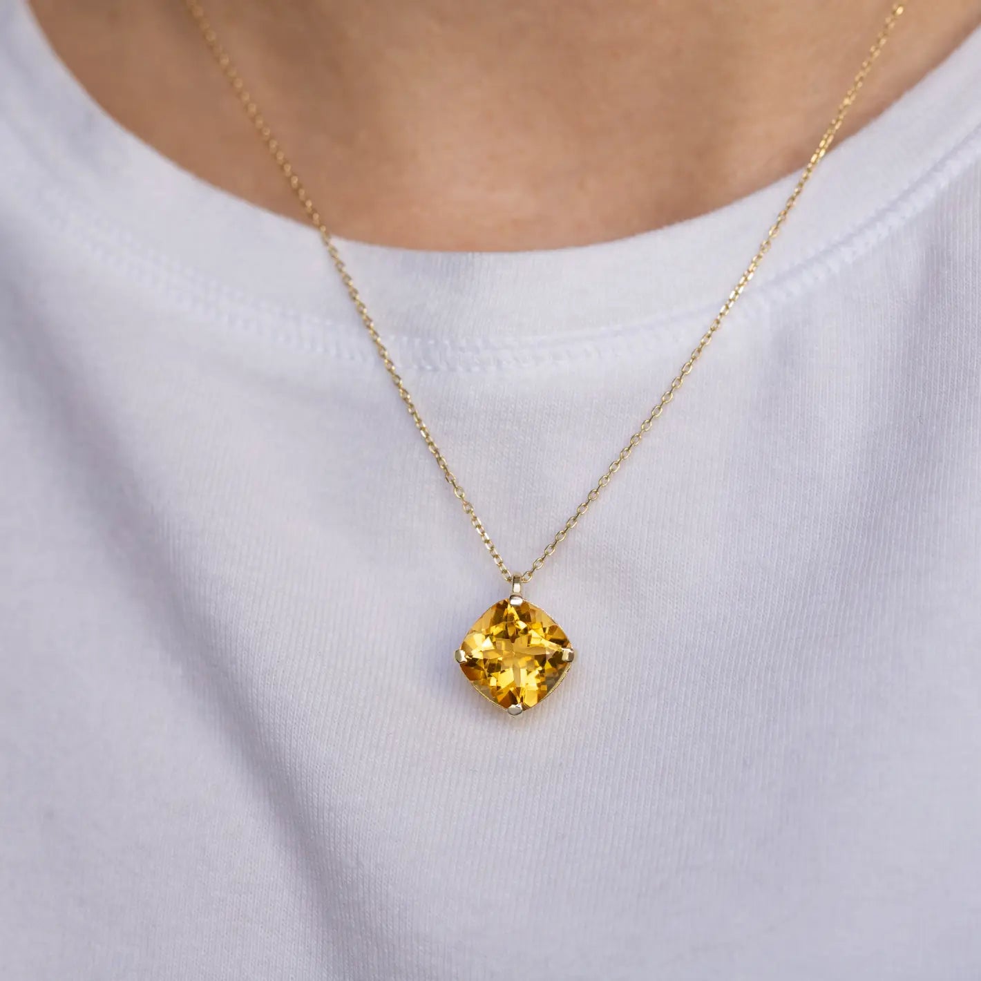 Citrine Necklace 14K Gold Cushion Cut displayed on a person, showcasing the handmade design and elegant citrine stone in a 14K gold setting.