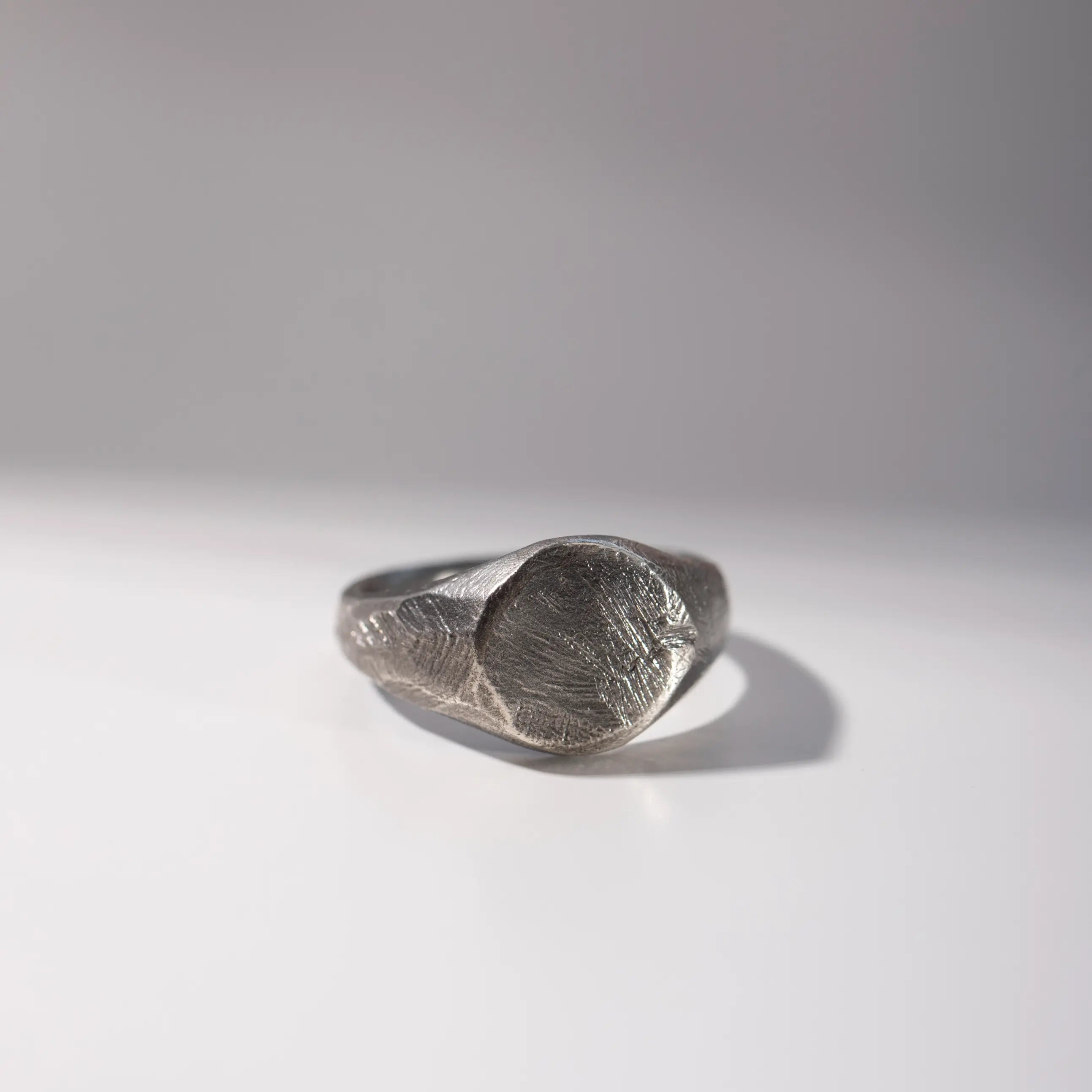 Round Ring Oxidized Silver 925, handcrafted sterling silver ring with black finish on white background.