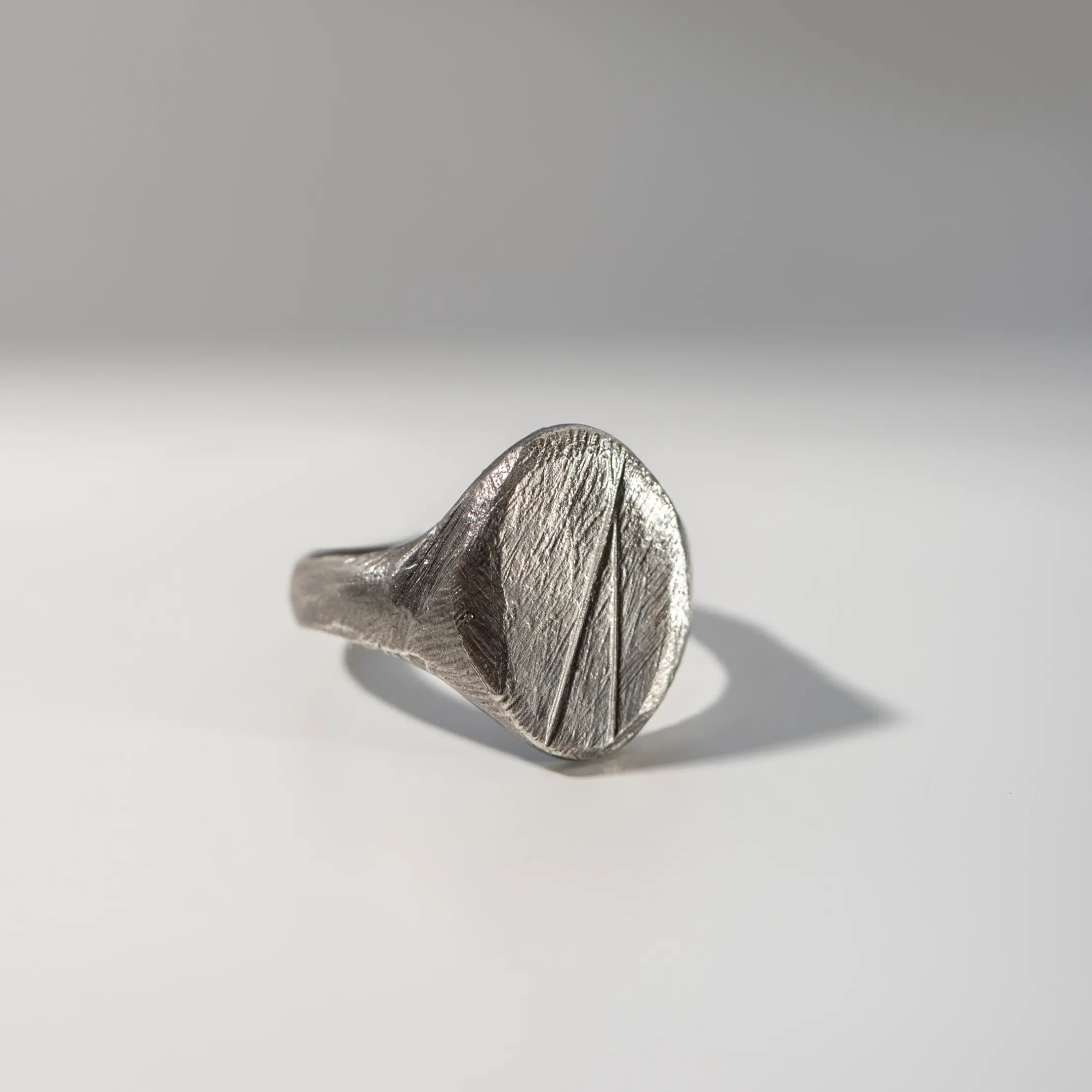 Oval Statement Ring Oxidized Silver 925 in brutalist style for men, featuring a black oxidized finish, handcrafted design, and wide flat top.
