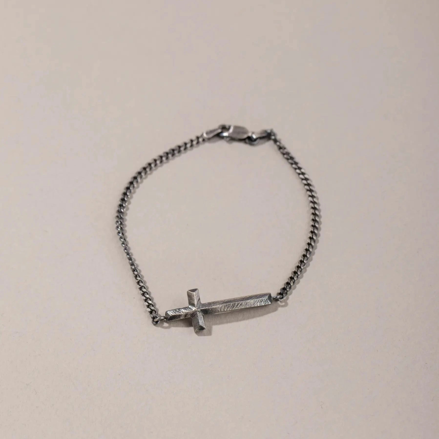 Cross Men's Bracelet Oxidized Silver with sterling silver curb chain and faceted cross charm.