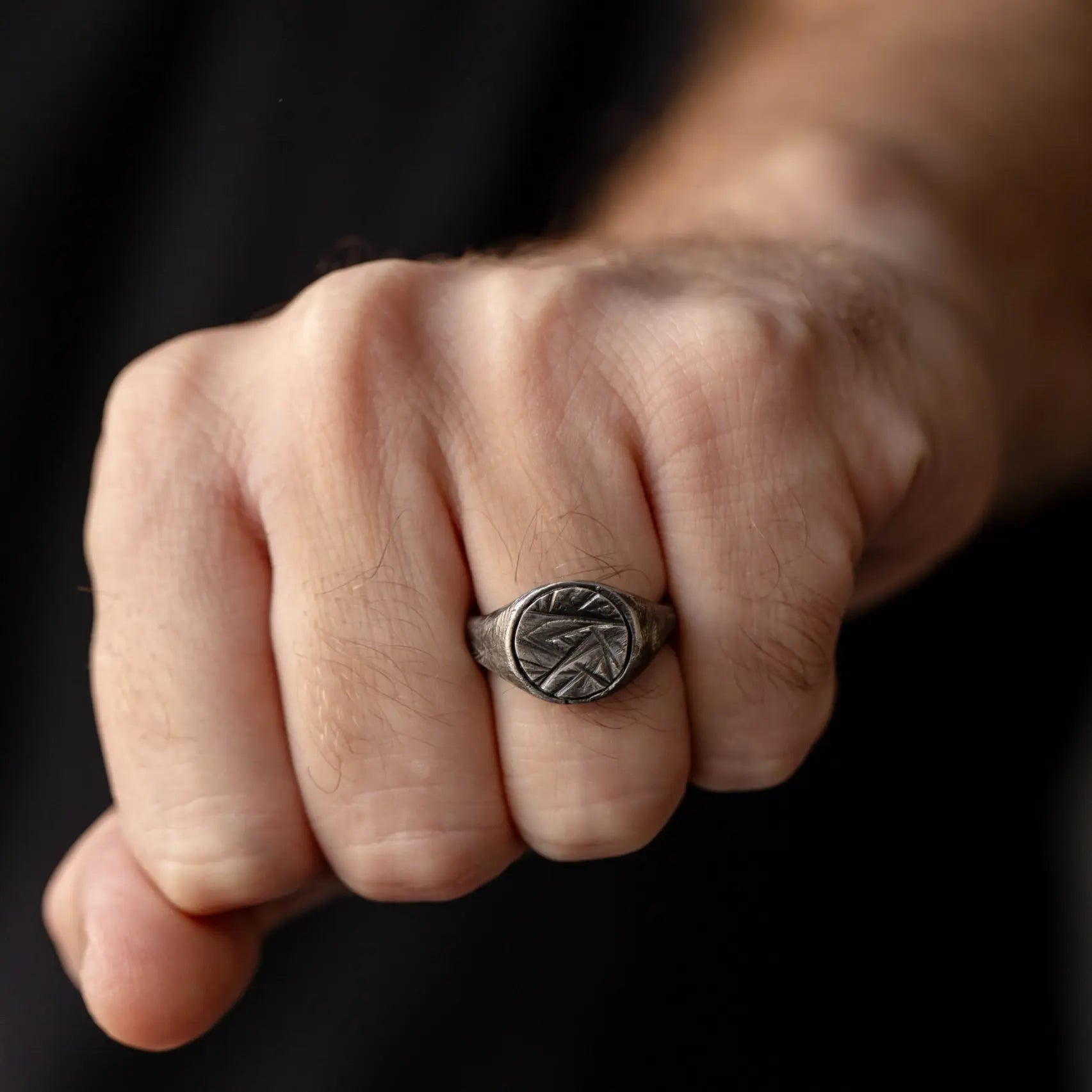 Flat Top Ring Oxidized Silver 925 on hand, showcasing brutalist style and black oxidized finish, made from high-quality 925 sterling silver.