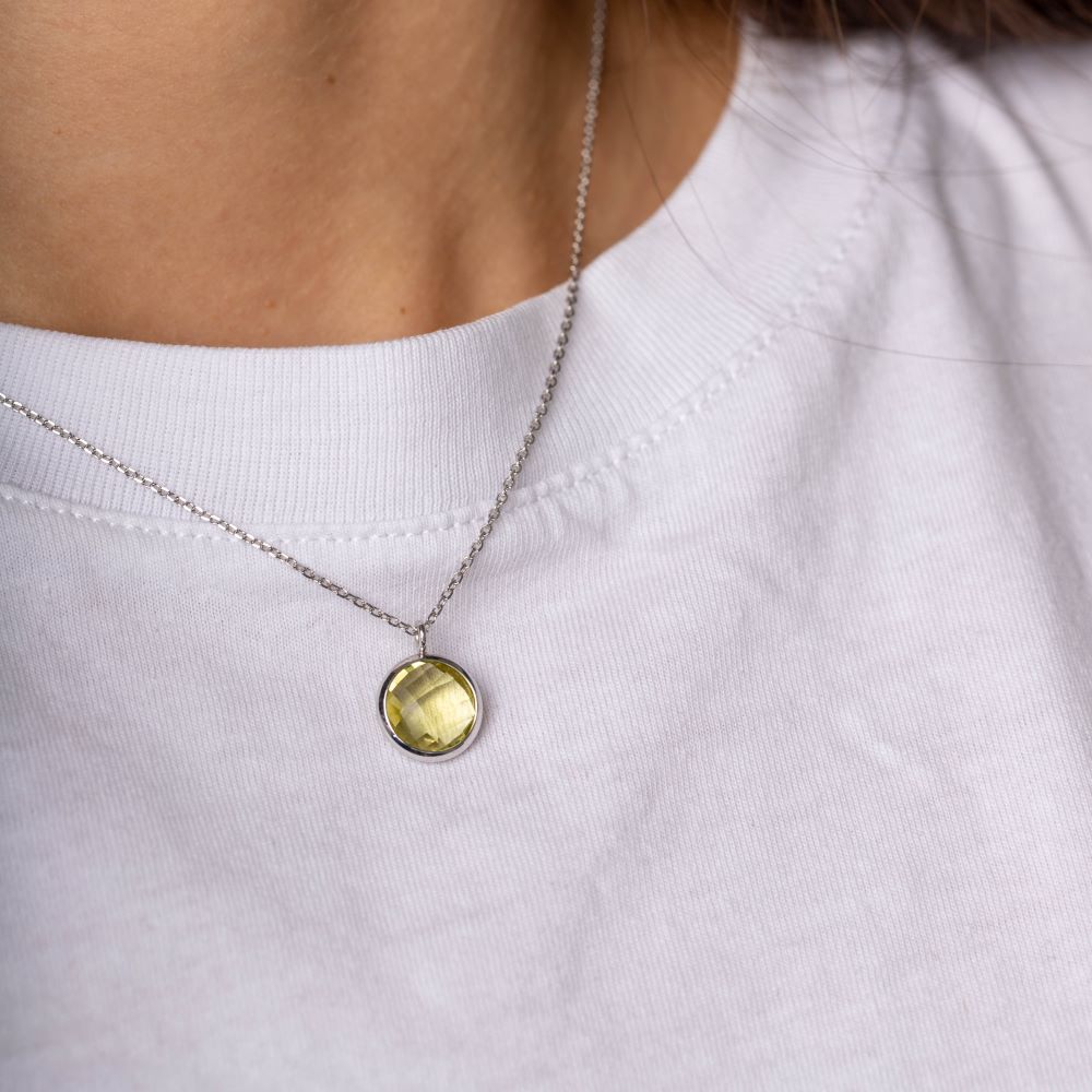 Lemon Quartz Necklace in 14K Gold elegantly worn, showcasing its natural beauty and brilliance on a delicate chain.