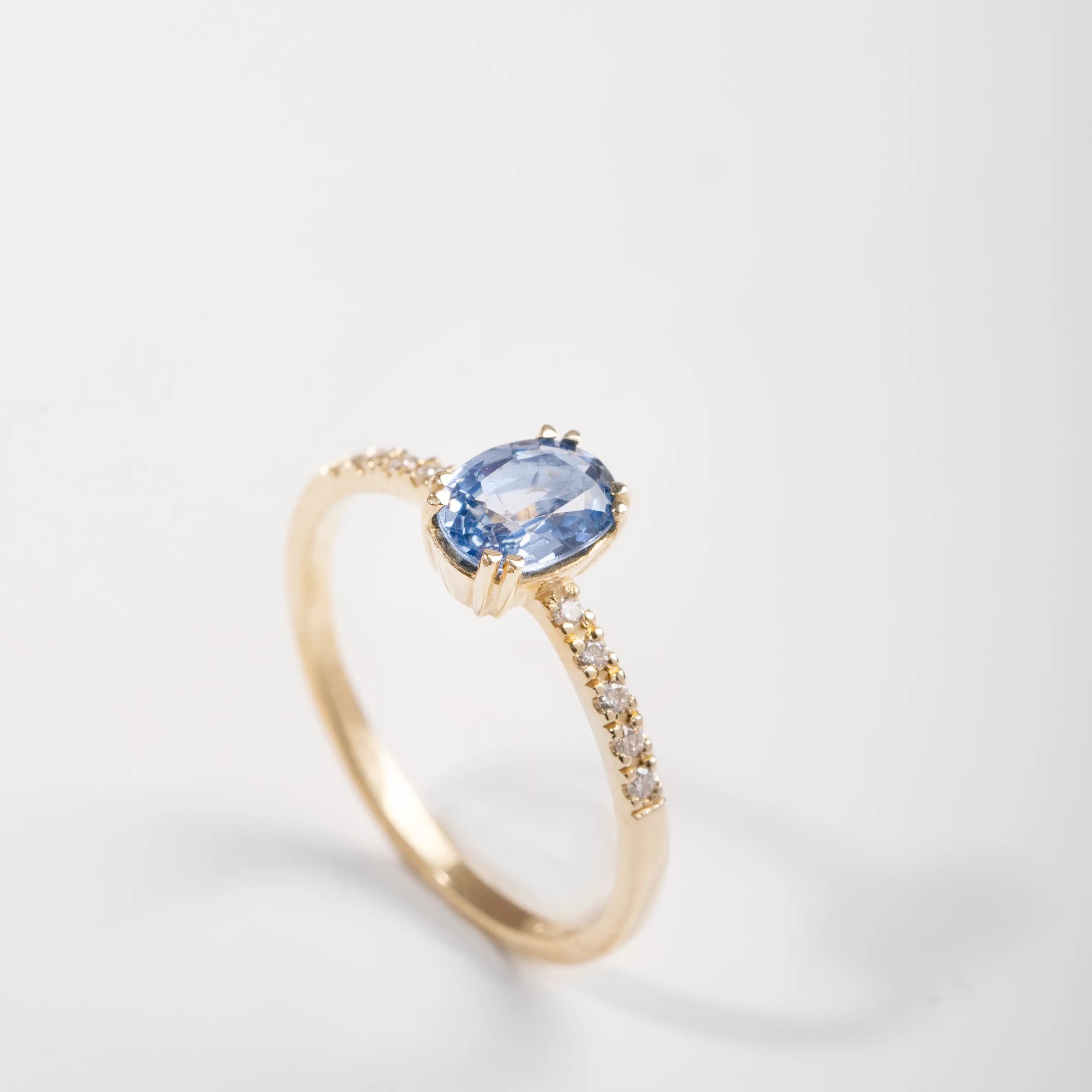 Diamond Blue Sapphire Engagement Ring in 14K gold with Ceylon blue sapphire and 10 brilliant diamonds, perfect for proposals.