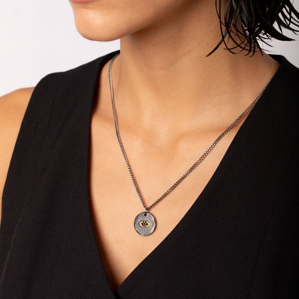 Evil Eye Necklace Black Diamonds Oxidized Silver 14K Gold on Woman