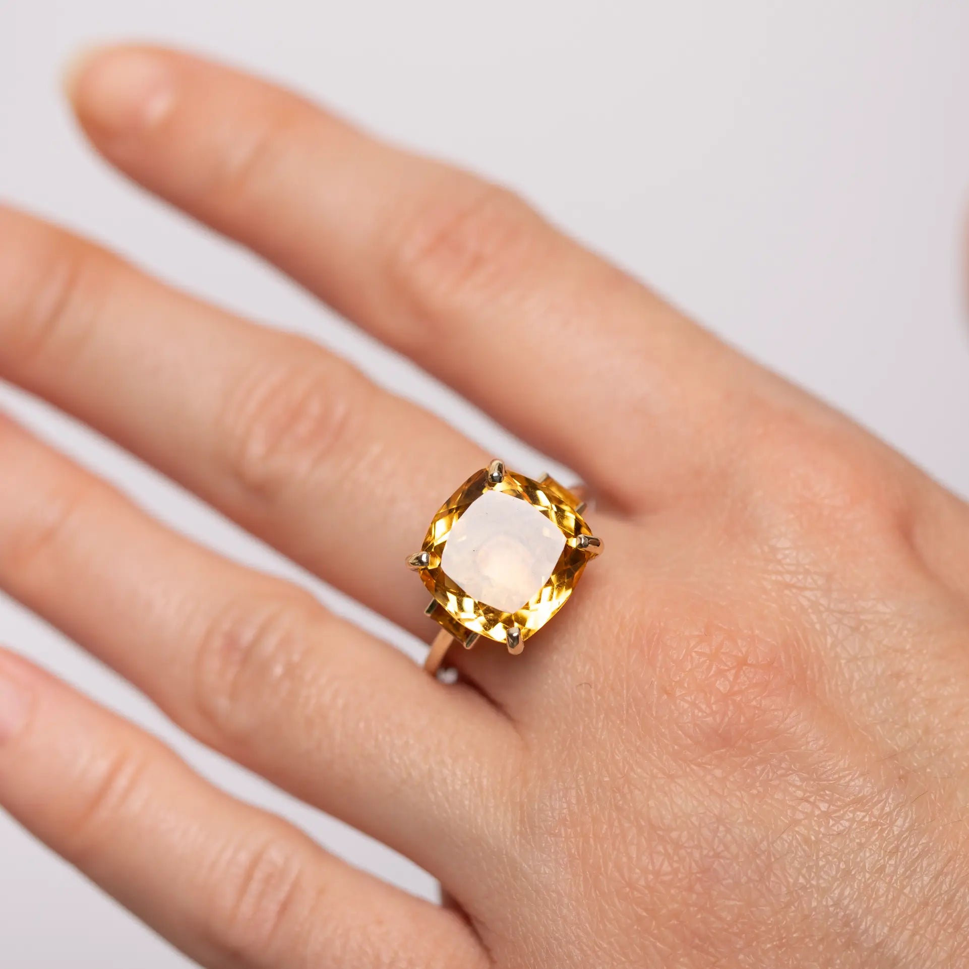 Citrine Ring 14K Gold Cocktail on hand, featuring cushion cut citrine gemstone, ideal for gifts and proposals. Elegant jewelry piece.