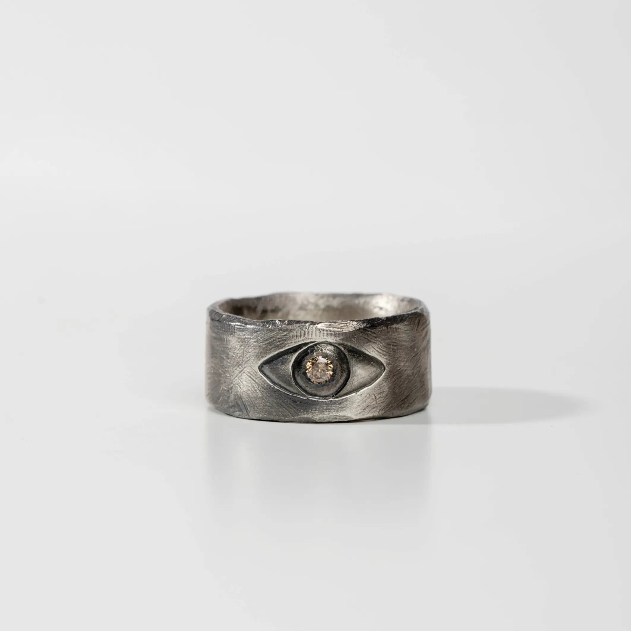 Evil Eye Ring with Brown Diamond in Oxidized Sterling Silver, elegant jewelry piece for fashion-forward individuals.