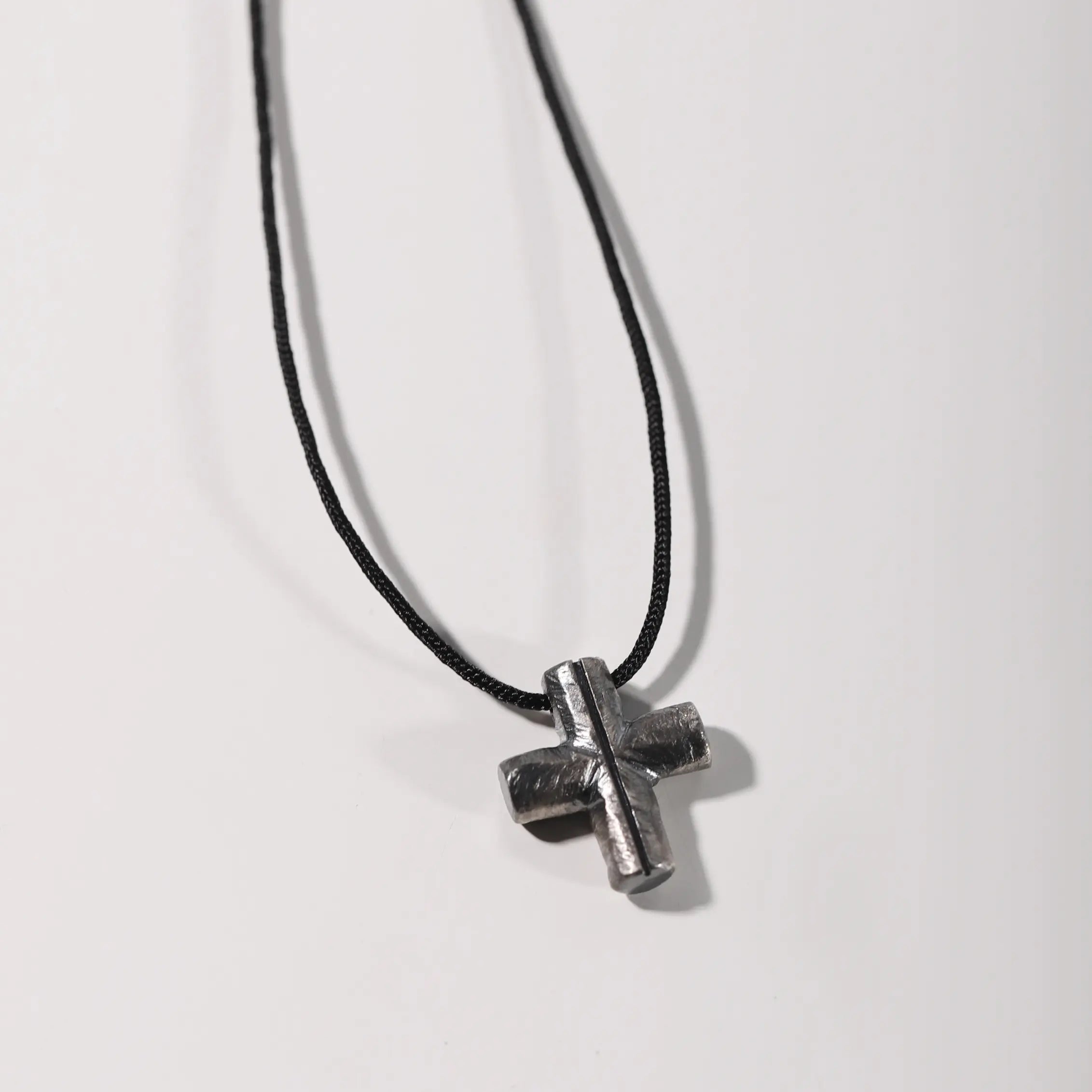 Small Square Cross Necklace Oxidized Silver Black Diamond on a black cord, perfect hand-made gift in sterling silver for brutalist style lovers.