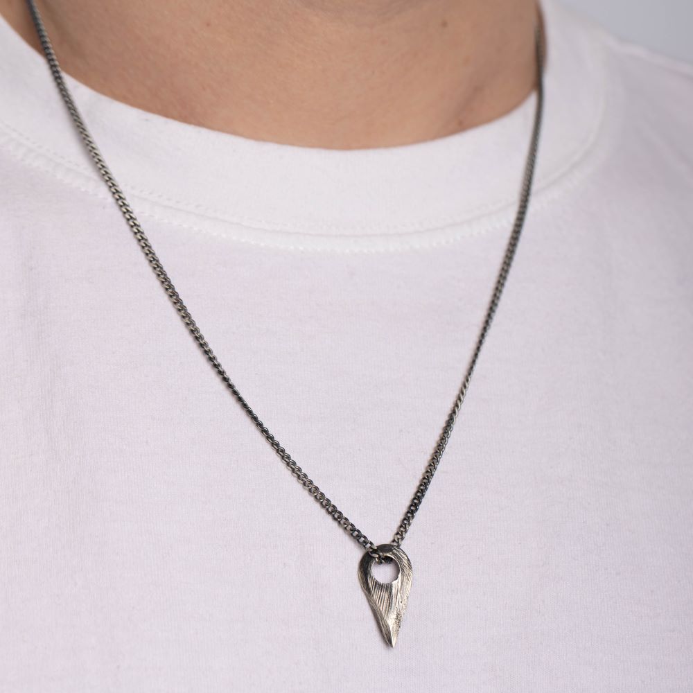 Viking arrow necklace in oxidized sterling silver with arrowhead pendant for men, featuring unique brutalist design and curb chain, 60cm long.
