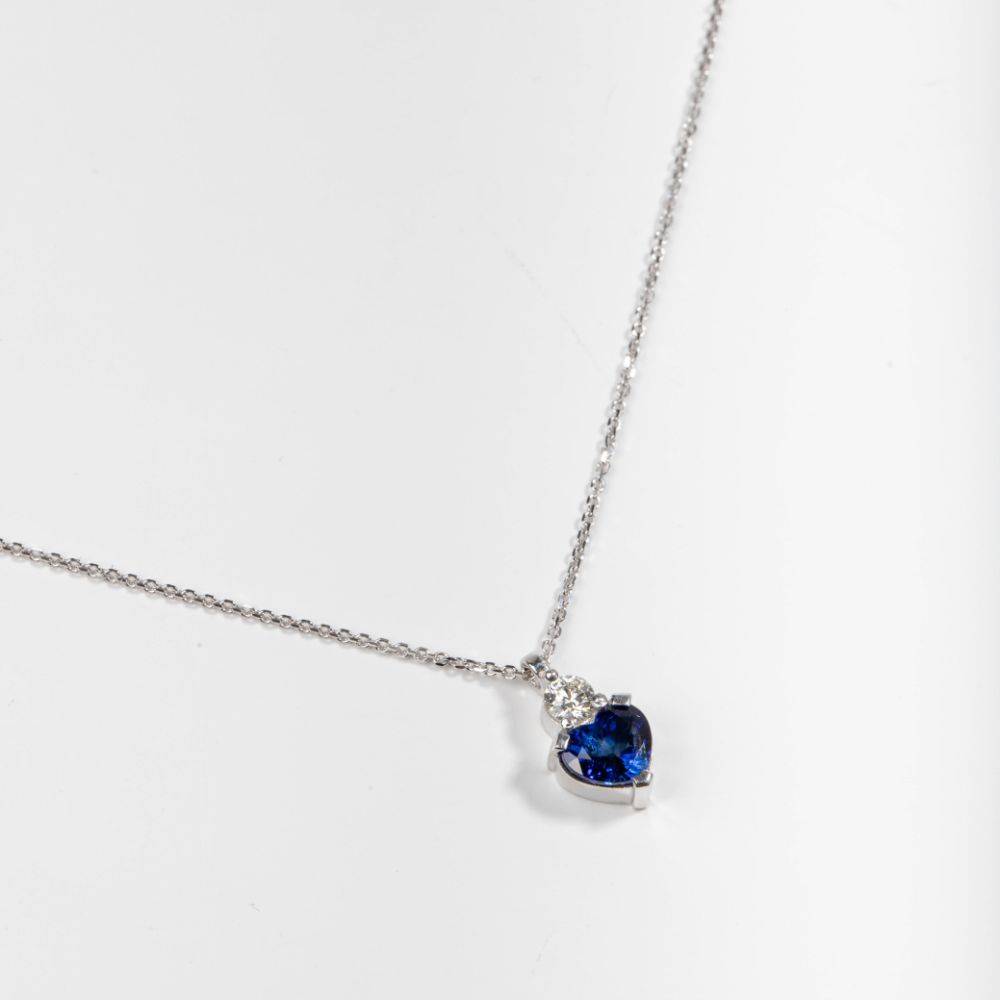Blue Sapphire Heart Diamond Necklace 18K White Gold with heart-shaped sapphire and diamond on a delicate chain, perfect gift idea.