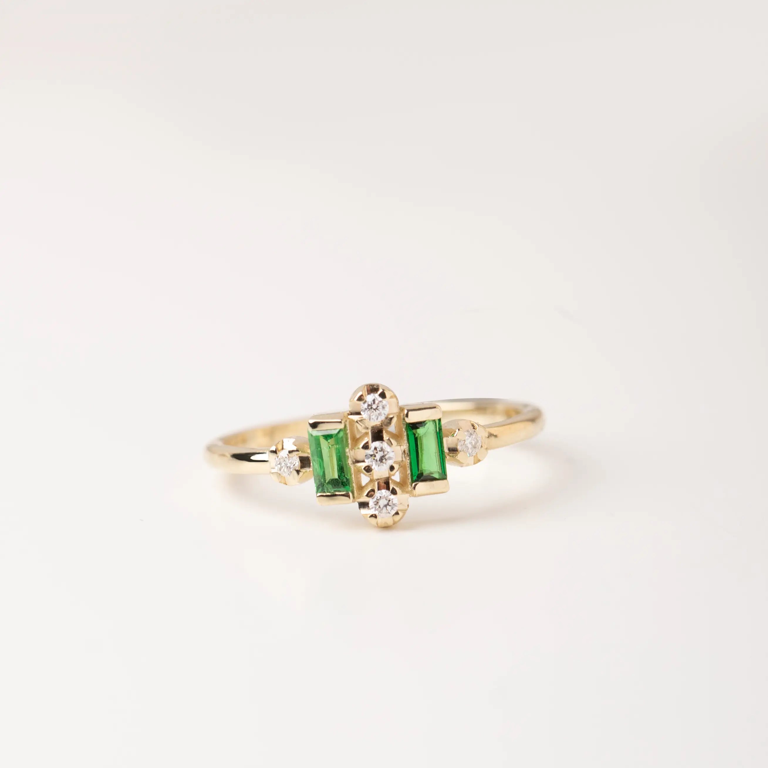 14K Gold Ring Tsavorites Diamond Baguette with art deco design, featuring green tsavorite gemstones and clear diamonds, perfect for an anniversary gift.