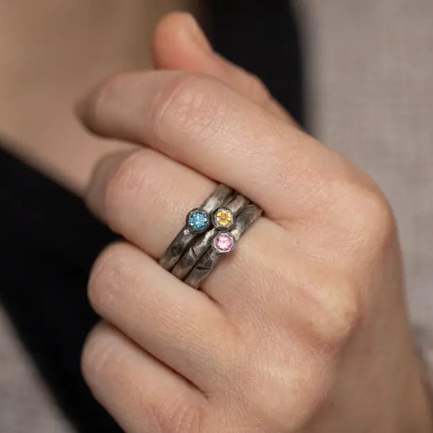 Pink Tourmaline Ring Oxidized Silver 925 on hand, showcasing brutalist design with black oxidized sterling silver.