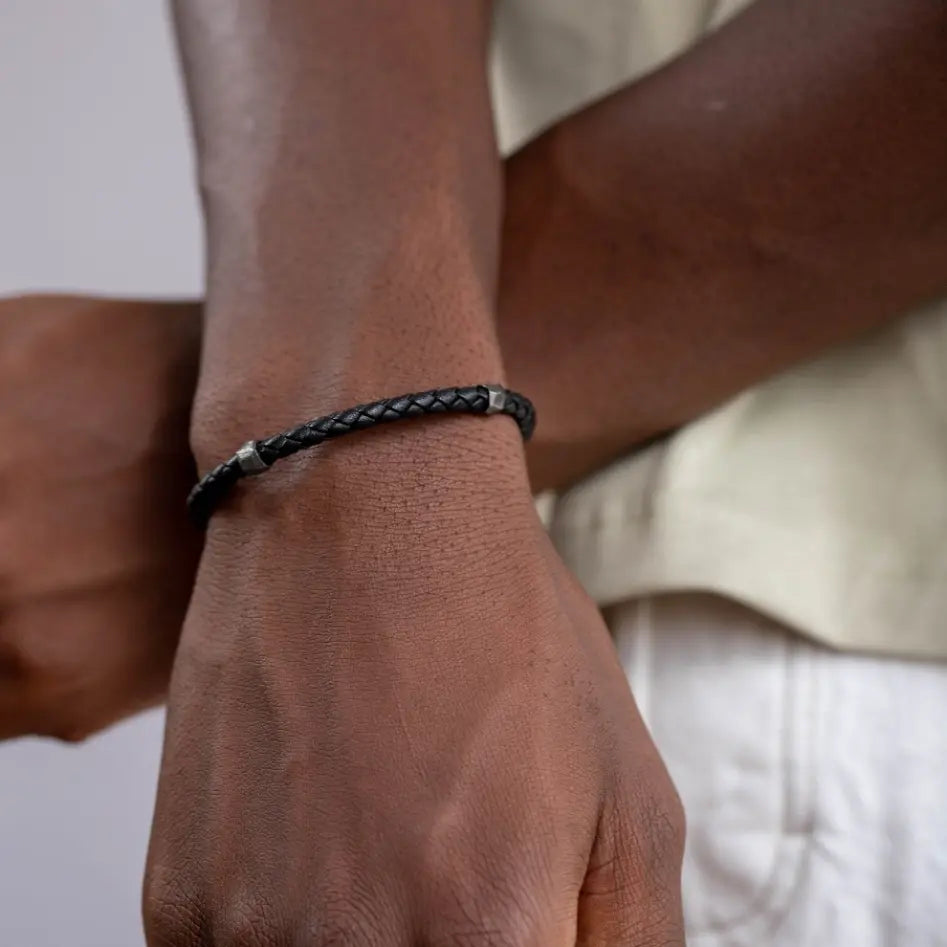 Silver black leather bracelet men with braided design and oxidized sterling silver accents, perfect for gifting.
