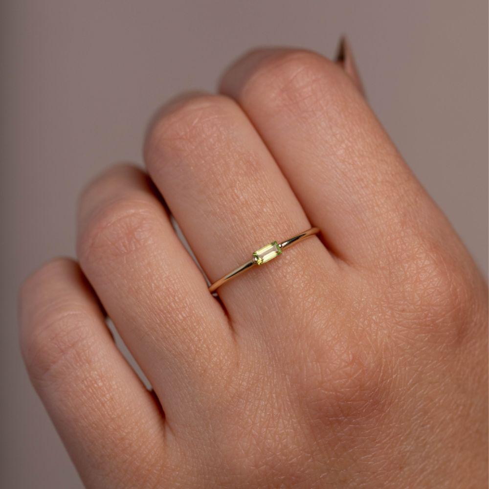 14K Peridot Baguette Ring Kyklos Jewelry