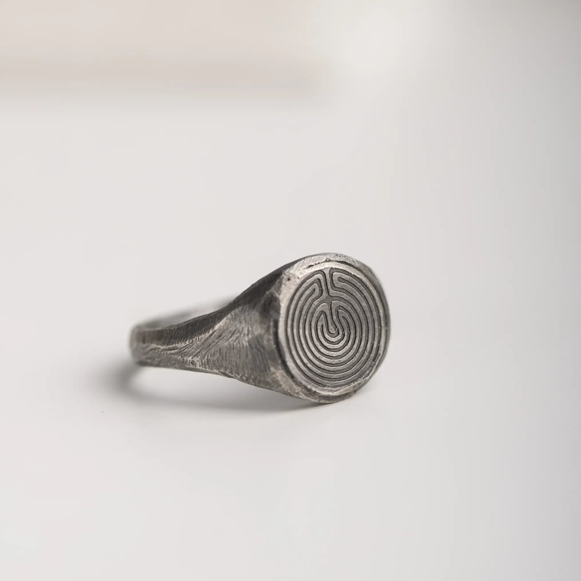 Labyrinth Ring Oxidized Silver 925 with intricate ancient Greek design on white background.