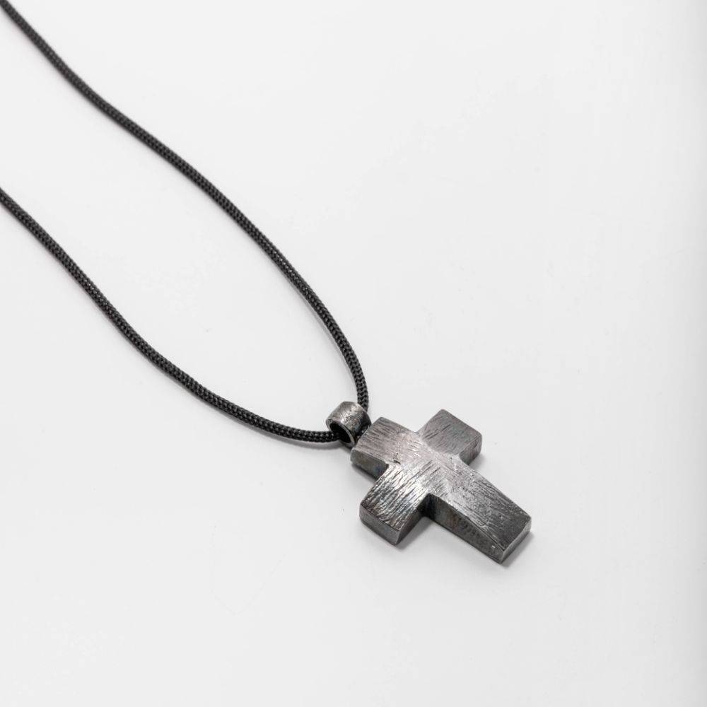 Men's oxidized silver cross necklace with black pendant on adjustable chain, handcrafted from sterling silver, ideal gift for him.