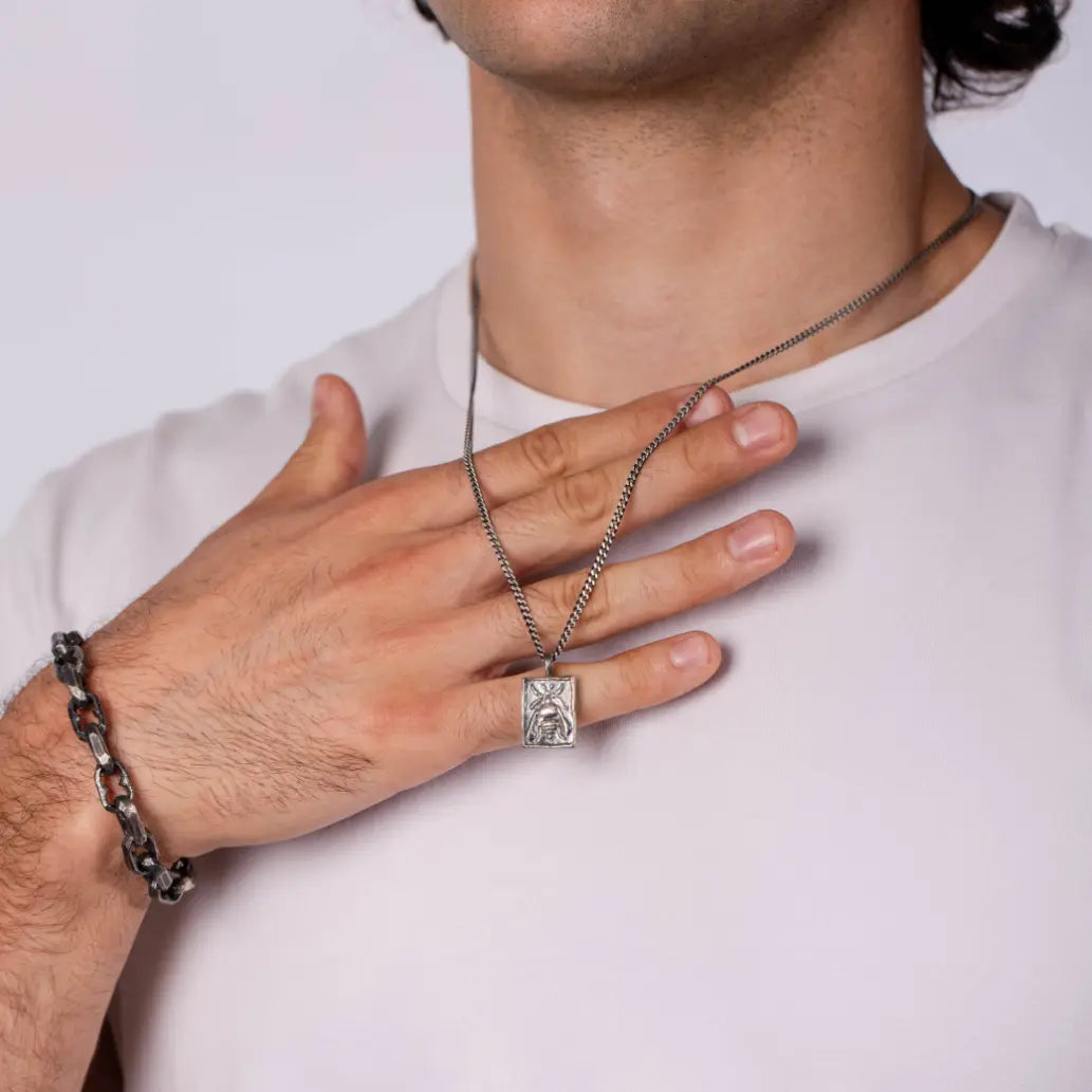 Ancient Greek Bee Necklace Oxidized Silver 925 worn by a person, showcasing intricate design and craftsmanship.