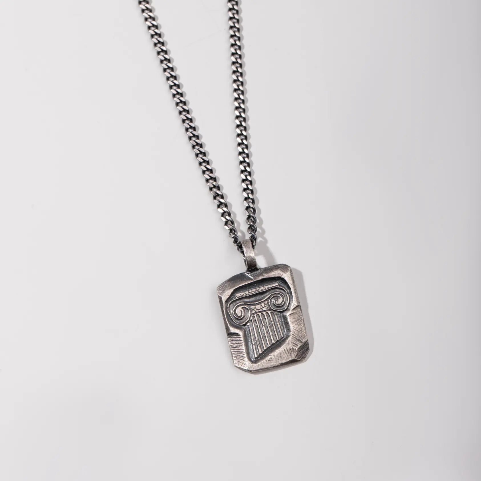 Ancient Greek Column Necklace Oxidized Silver 925 with intricate column design, highlighting classical architecture on a silver chain.