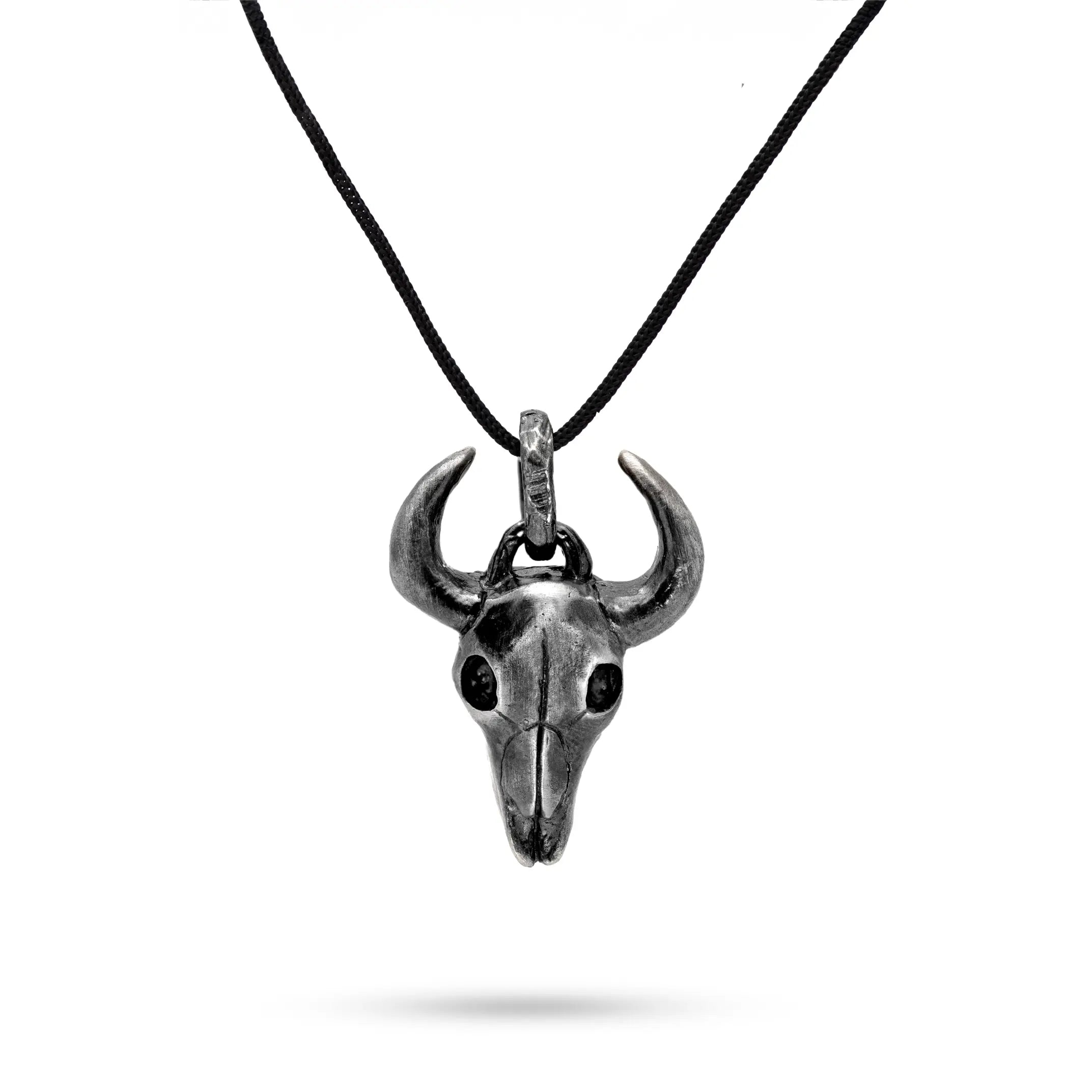 Oxidized sterling silver bull necklace on black cord with handcrafted pendant for men, made from 925 sterling silver.