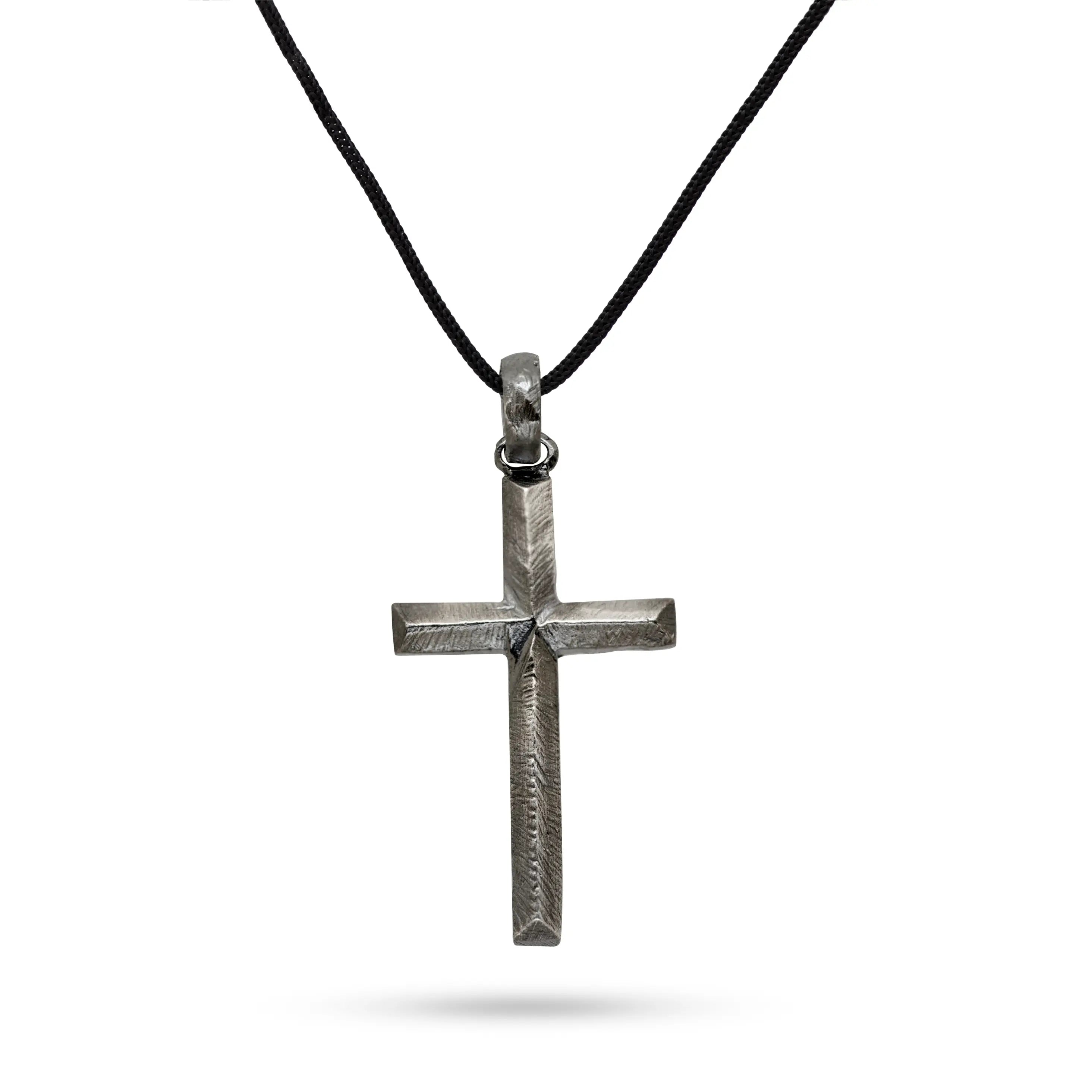 Oxidized silver cross necklace men on black cord, featuring handcrafted sterling silver cross pendant, ideal as a gift for him.