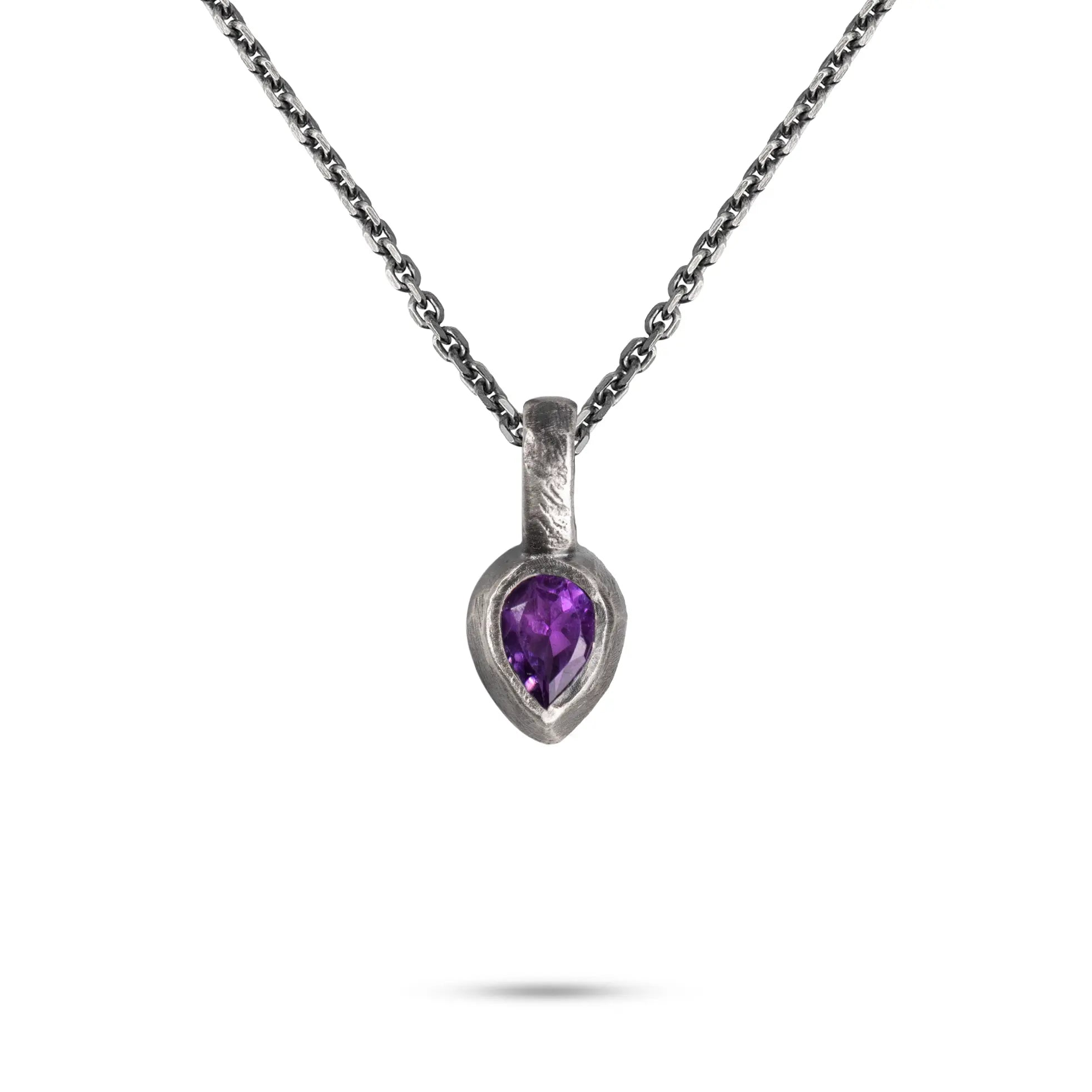 Purple Amethyst Necklace Sterling Silver 925 with hand-carved pendant and vibrant purple gemstone.
