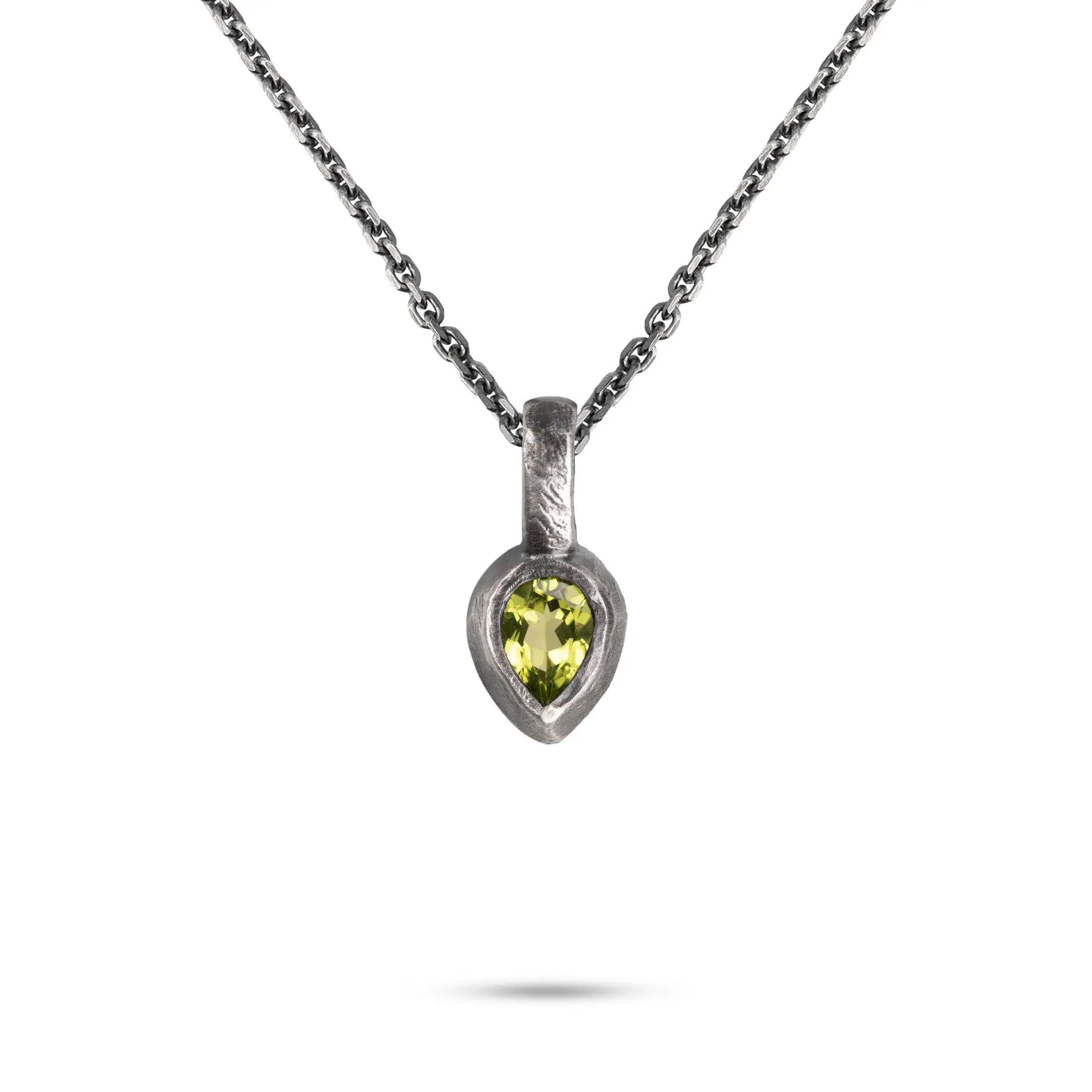 Peridot Necklace Sterling Silver 925 featuring a unique hand-carved pendant with a vibrant peridot gemstone.