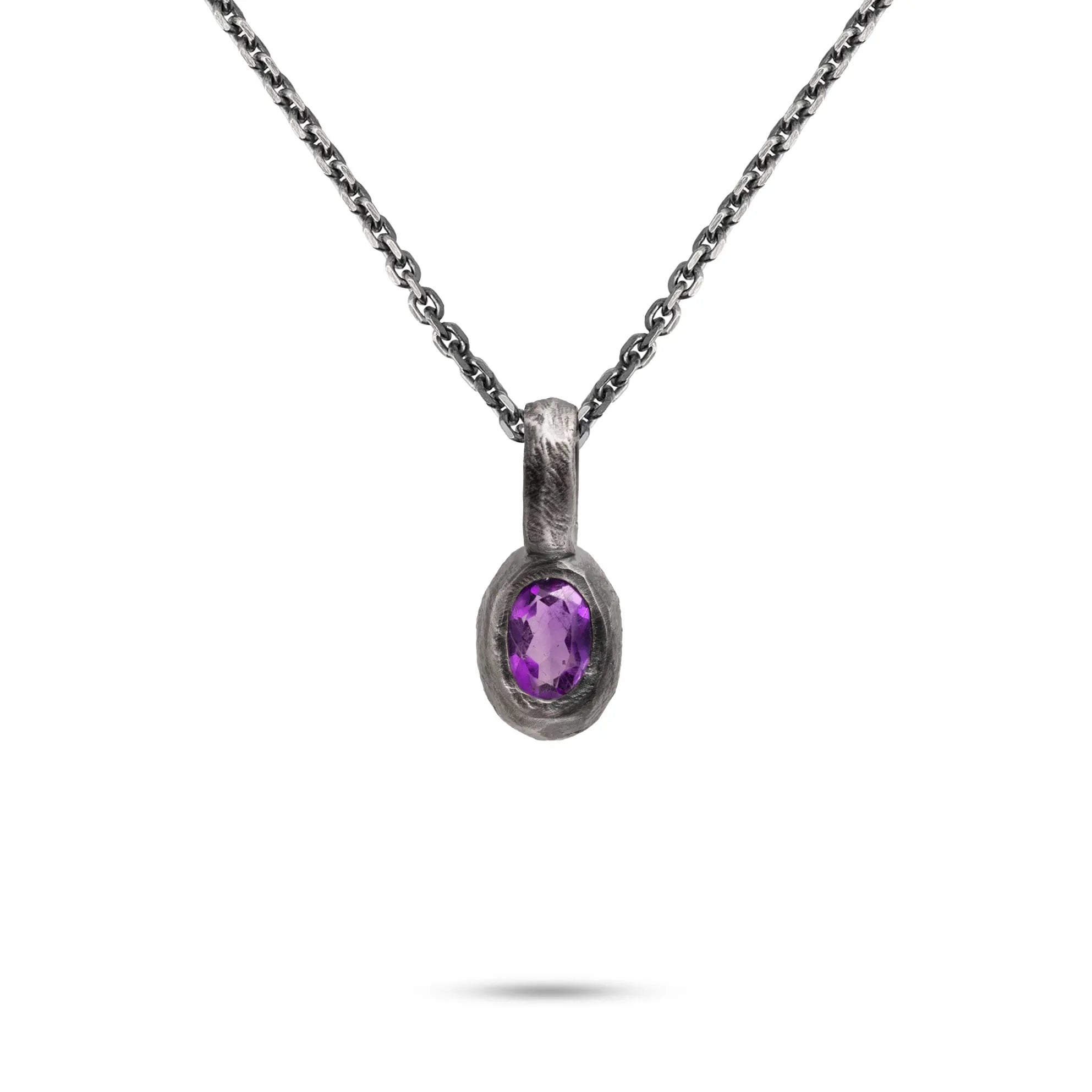 Amethyst Necklace Sterling Silver 925 featuring a raw, hand-carved pendant with a rich purple gem.