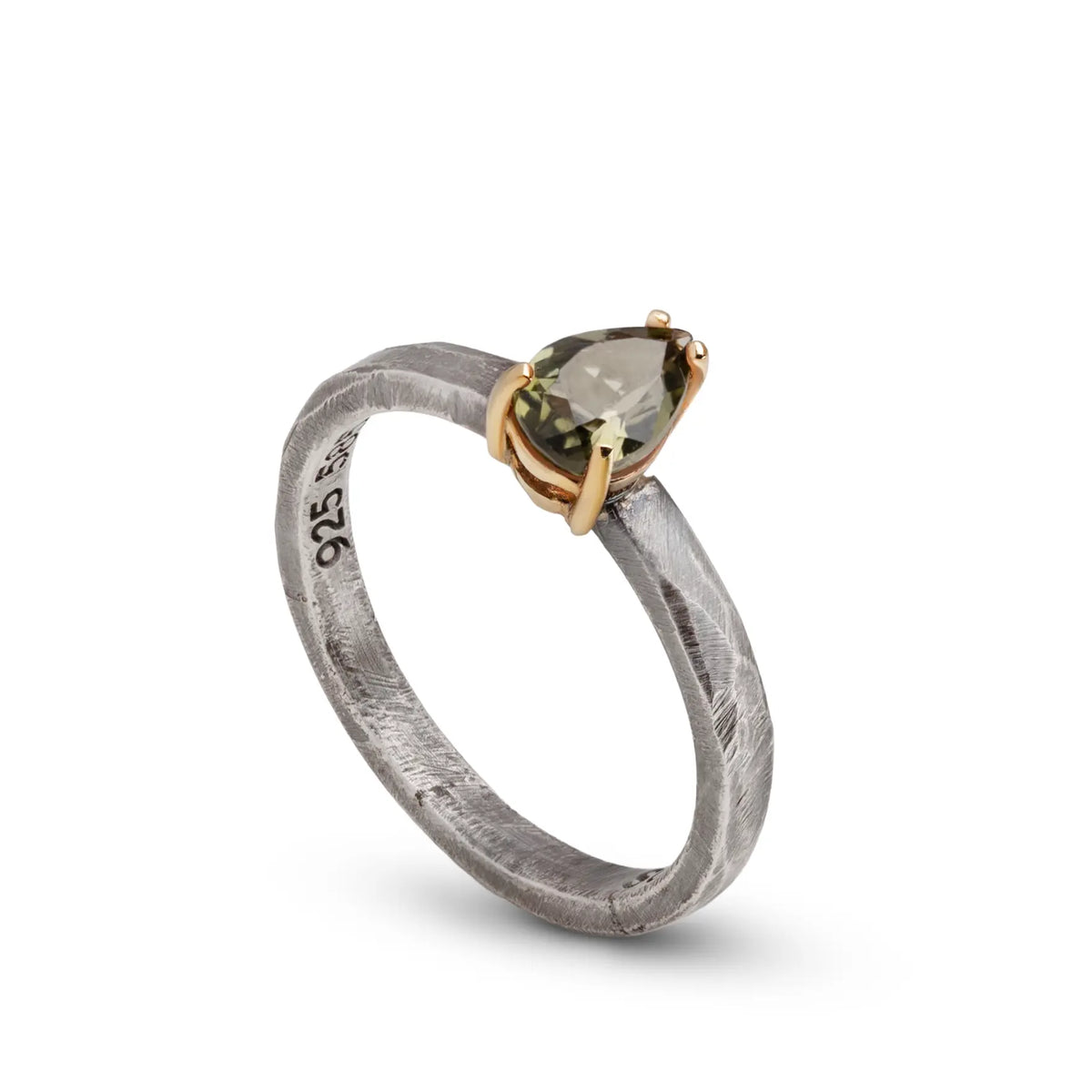 Green Tourmaline Ring In Silver And Gold featuring a pear cut gemstone in a silver and gold design.