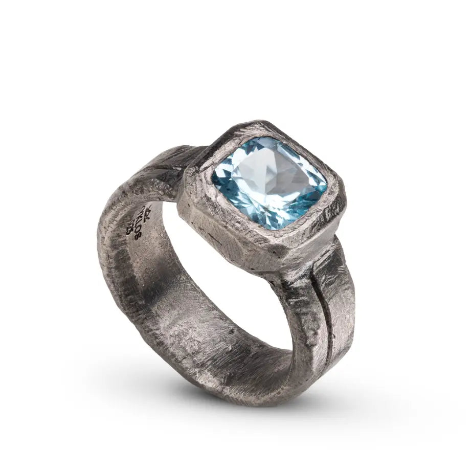 Blue Topaz Ring Silver 925, handcrafted black oxidized sterling silver with edgy brutalist design, featuring a mystical blue gemstone.