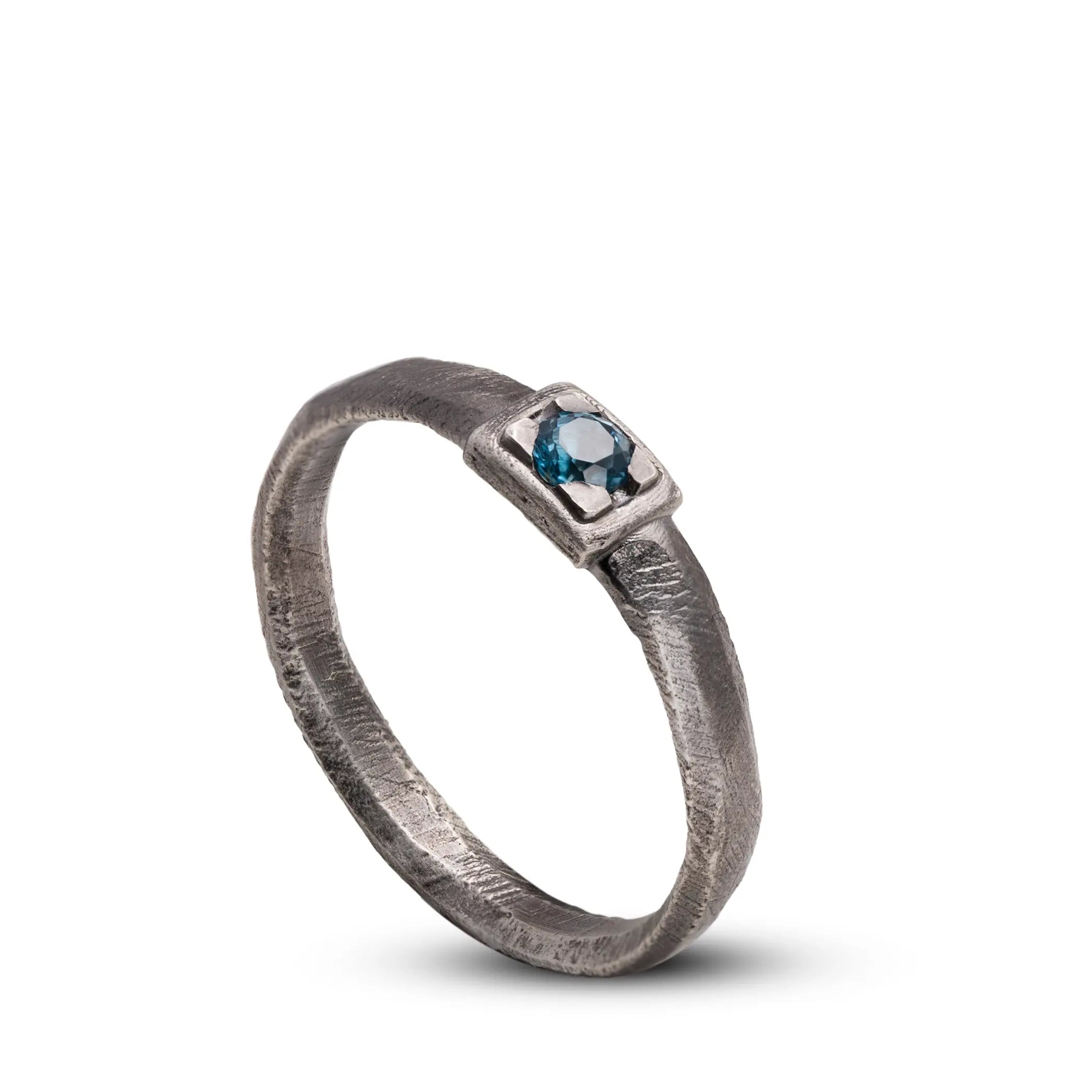 London Blue Topaz Ring Sterling Silver 925 featuring a deep blue gemstone in a brutalist design.