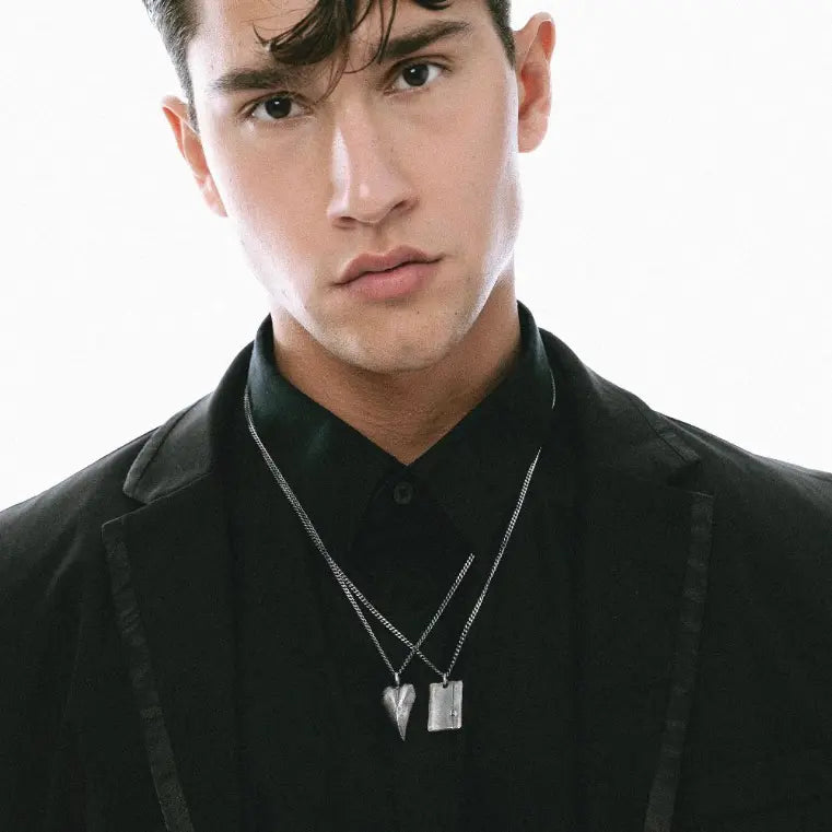 Model wearing Heart Necklace Oxidized Silver 925 with black oxidized finish on sterling silver chain, suitable for men and women.
