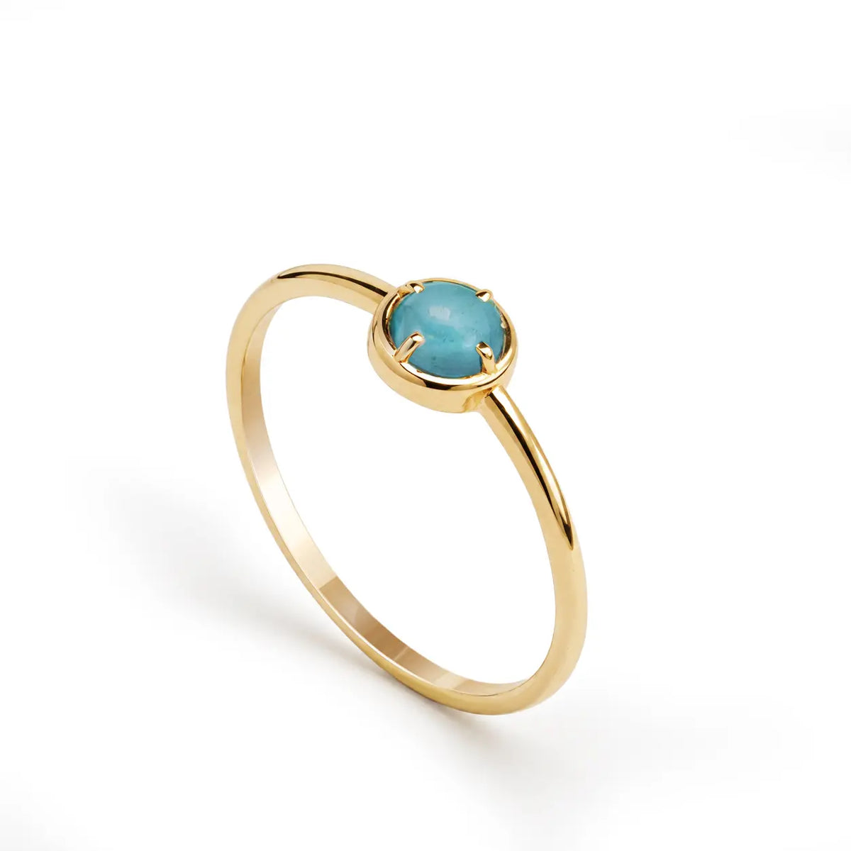 14K Gold Turquoise Ring featuring a natural turquoise gemstone in a gold band, ideal for stacking or as a gift.