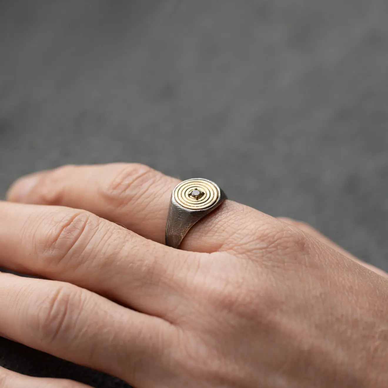 Round Ring 14K Gold and Silver With Brown Diamond on hand