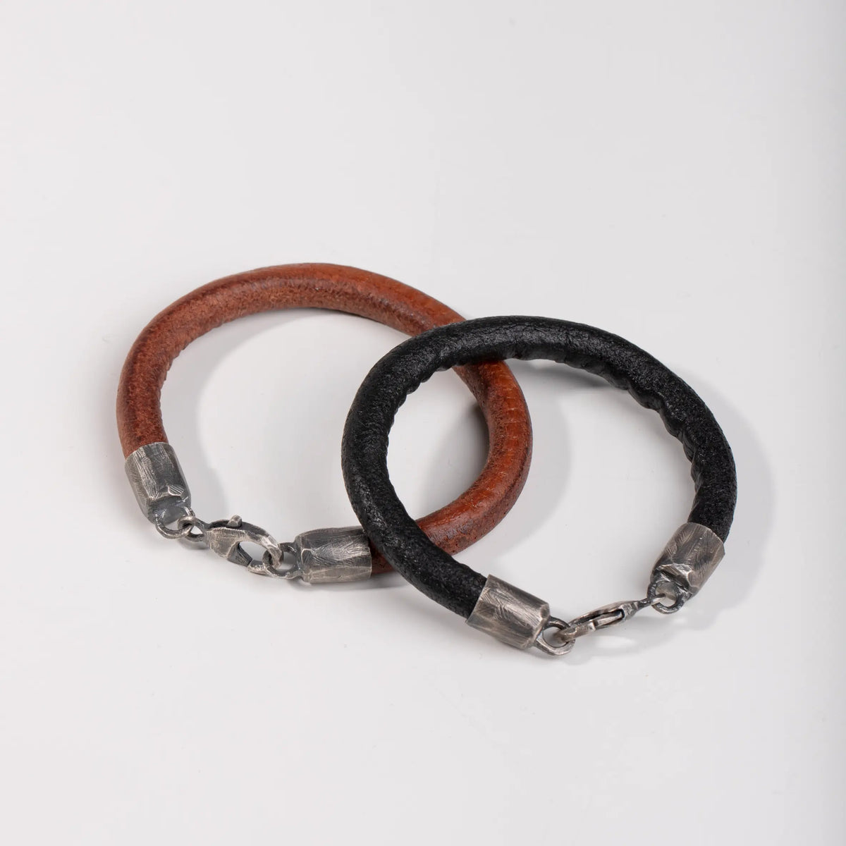 Close-up of Men's Leather Bracelet with Oxidized Silver Clasp