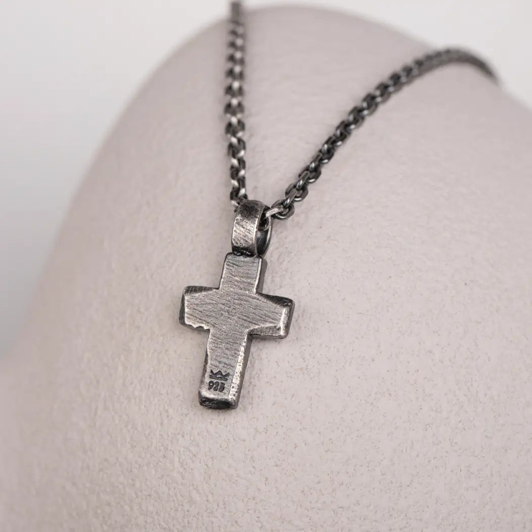 Stylish Silver Cross Necklace Black Enamel on display, showcasing a modern and elegant look for any occasion.