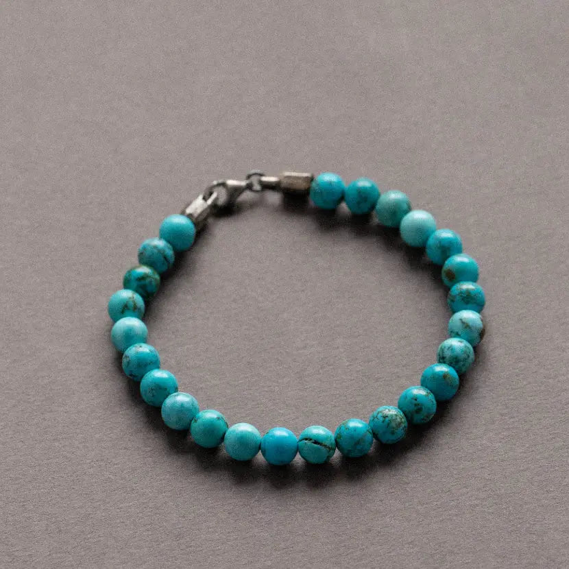 Turquoise Bracelet with 6mm natural gemstone beads and sterling silver details, displaying bold, masculine brutalist design.