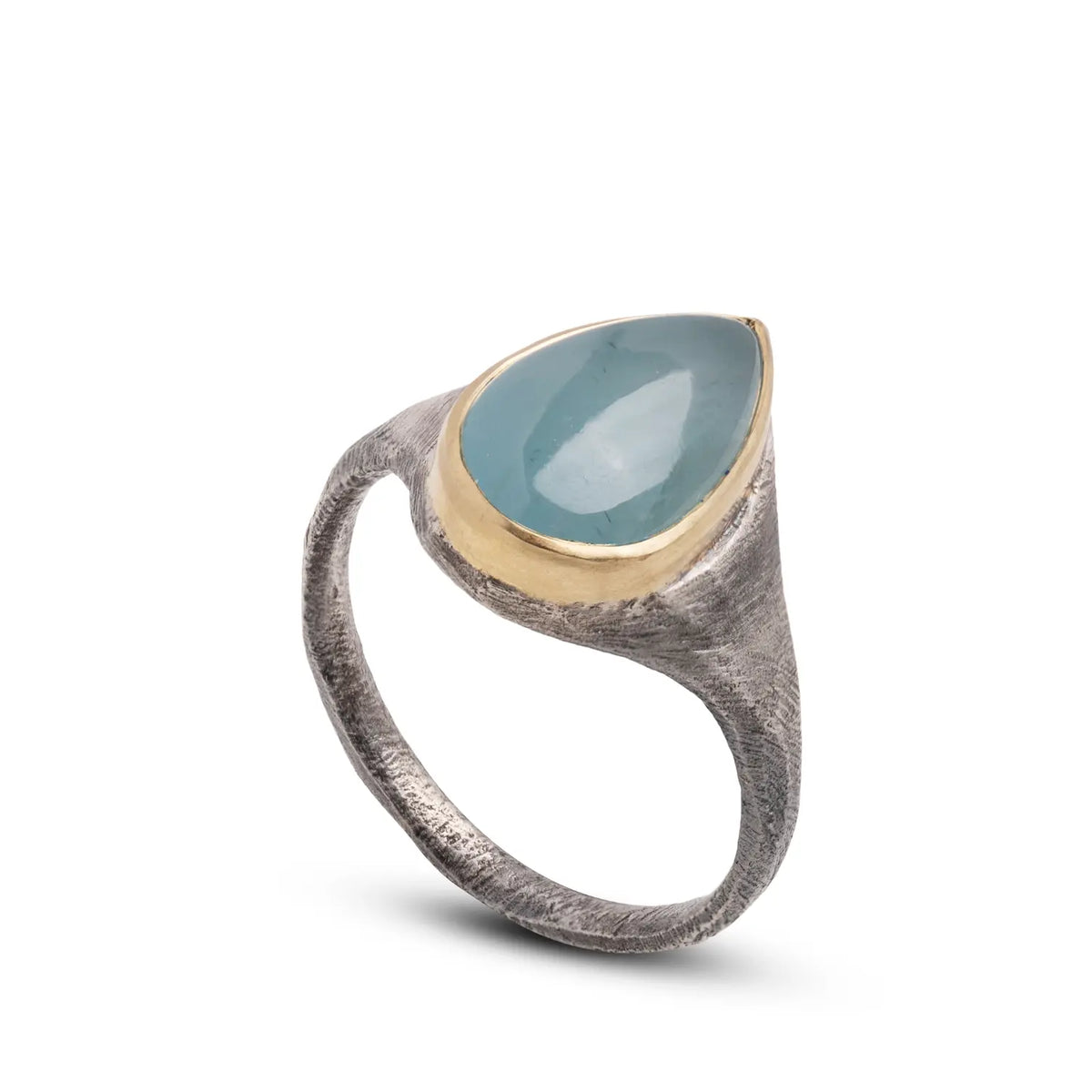Unique Aquamarine Ring In Silver And Gold with a pear cabochon aquamarine in gold and silver setting.