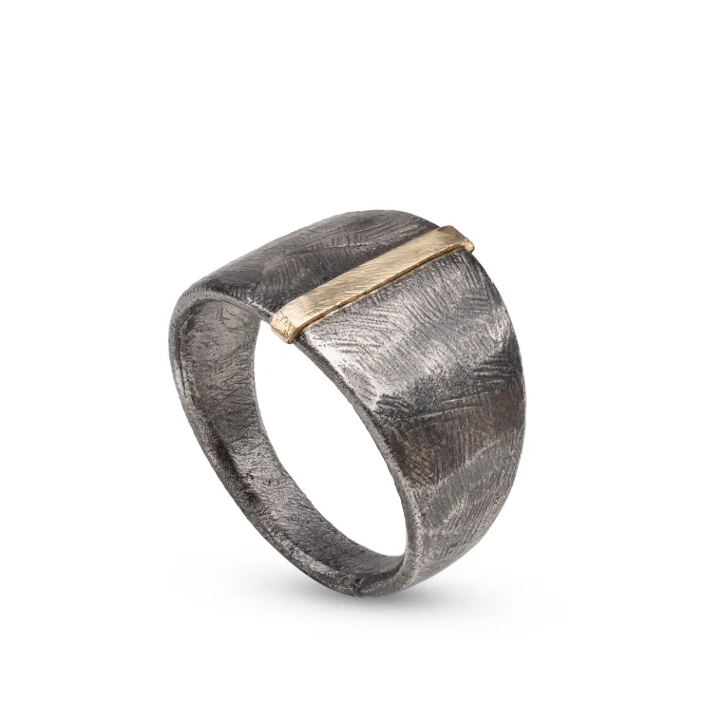 14K Gold & Oxidized Silver 925 Ring in brutalist style with gold accent and raw texture on white background.